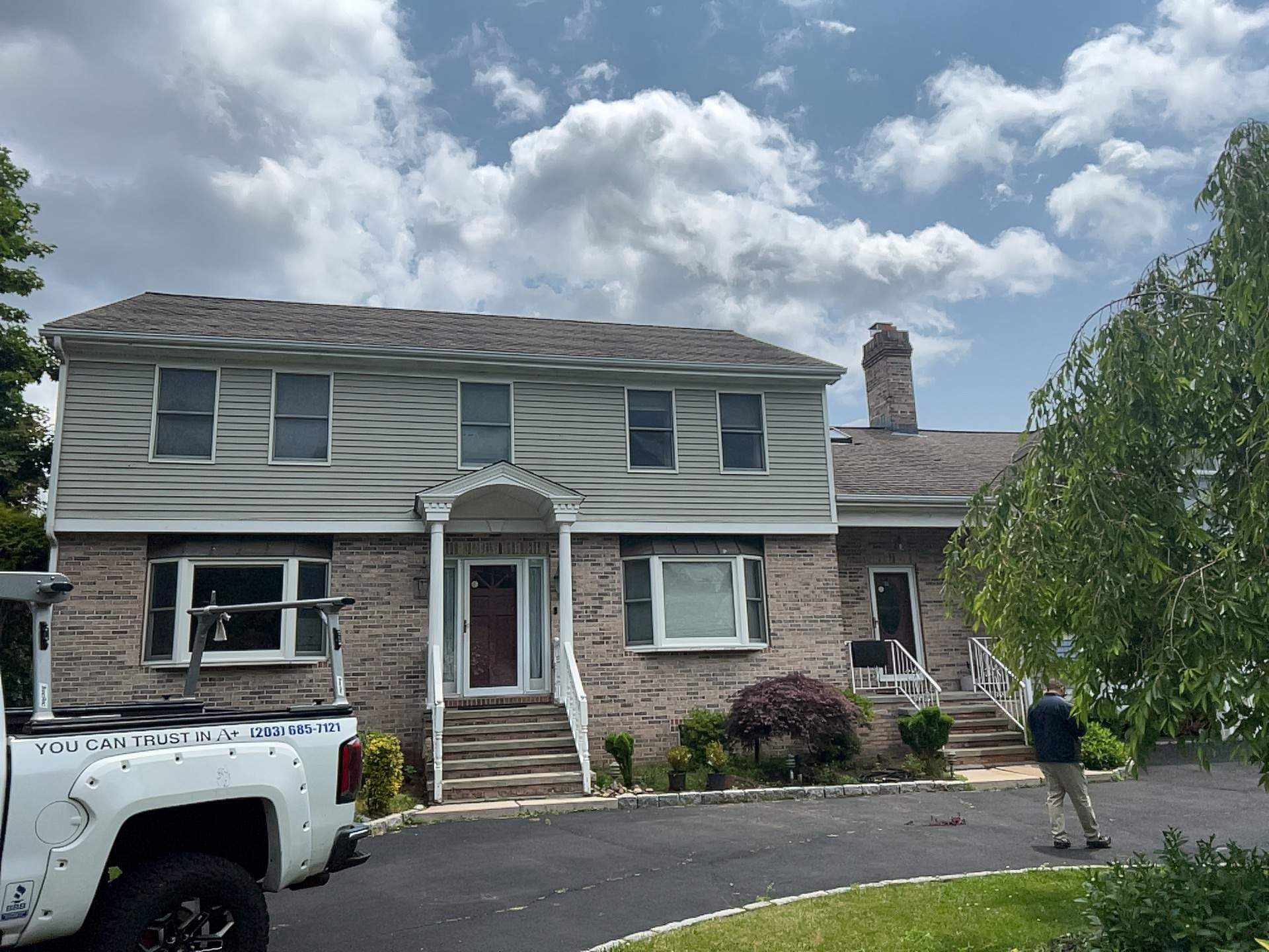 Siding Installation using Mainstreet Colonial & White gutters by A Plus Exterior
