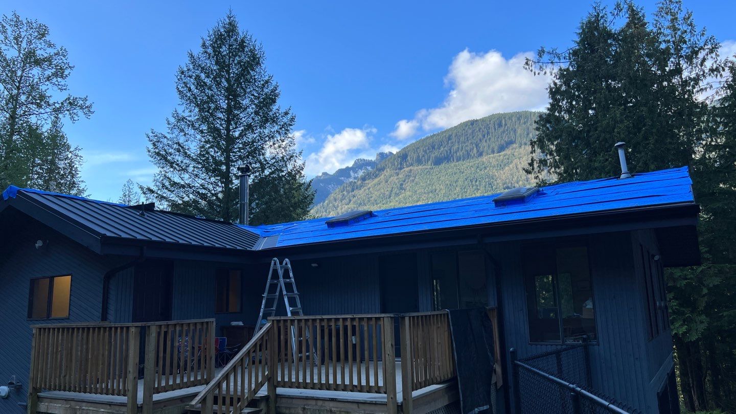 Residential ReRoofing Installation using 12" Prolok metal by Top Notch Roofing Inc