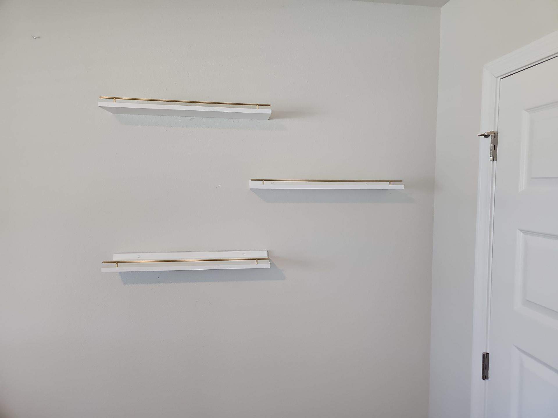 Art & Mirror Hanging Projects by Hangman Mounting & Installation 