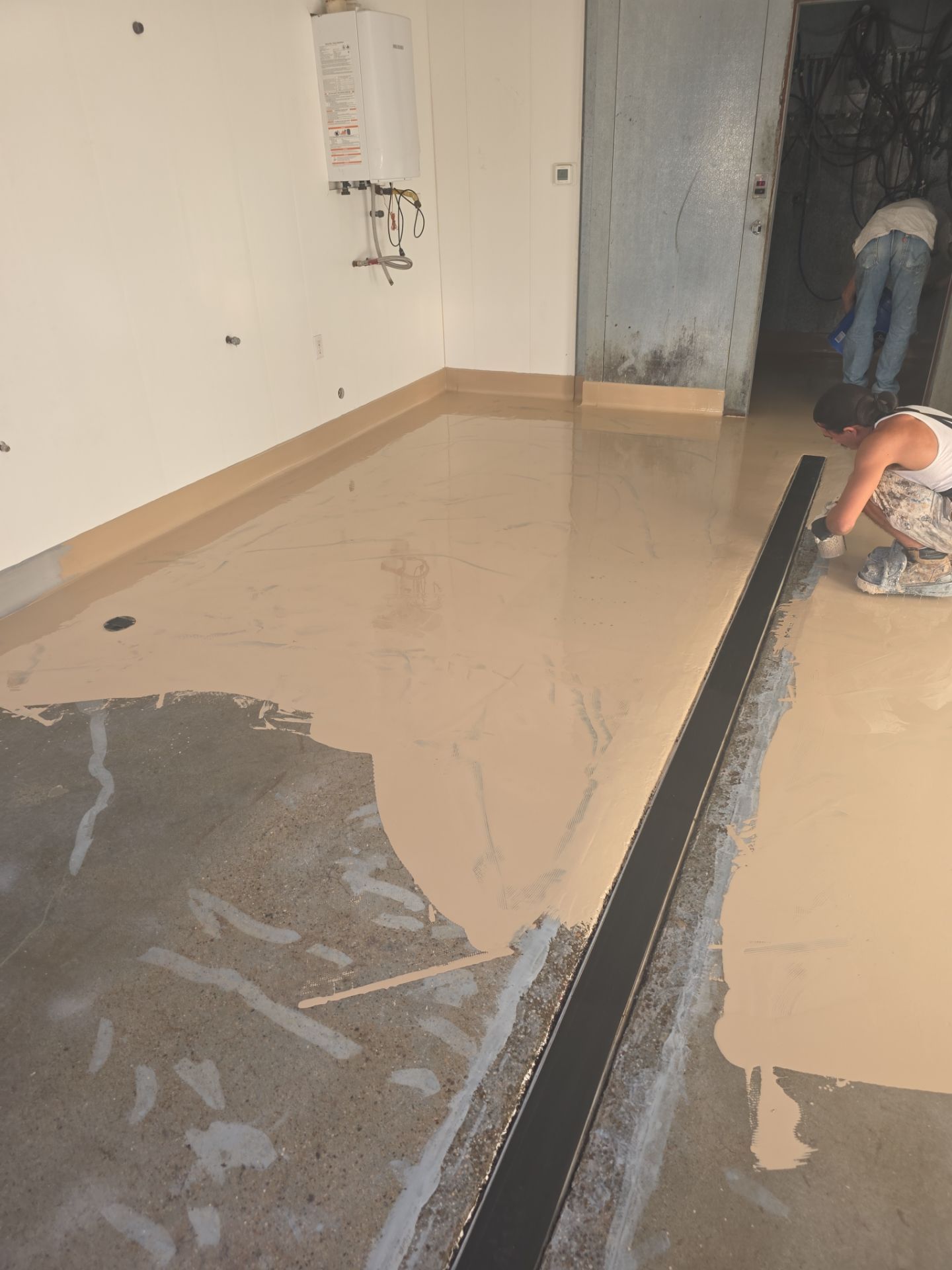 Industrial Red Quartz Polyurea Floor Installation for Atascadero Brewery by MGP Coatings