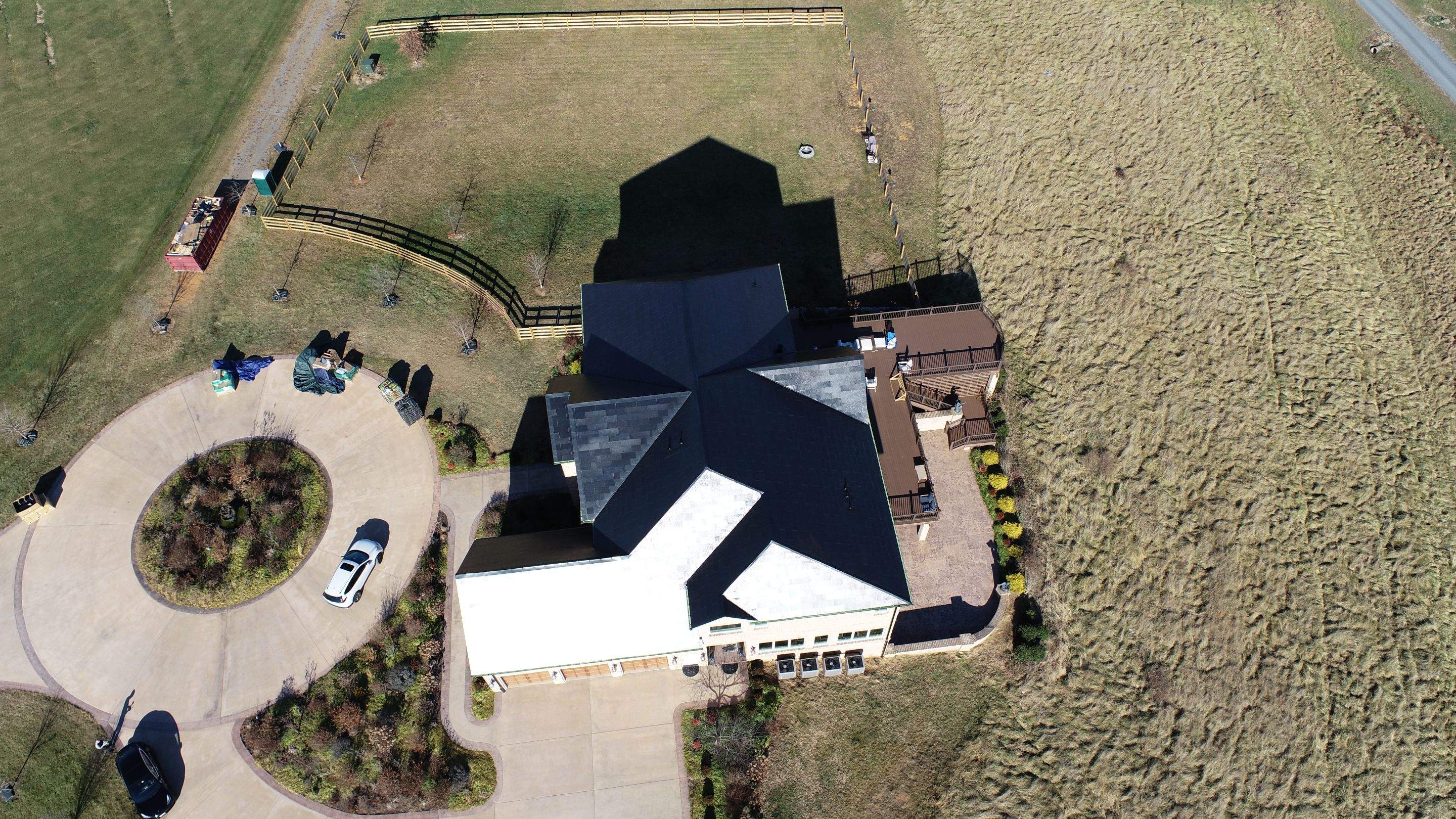 Tesla Solar Roof Replacement by American Home Contractors