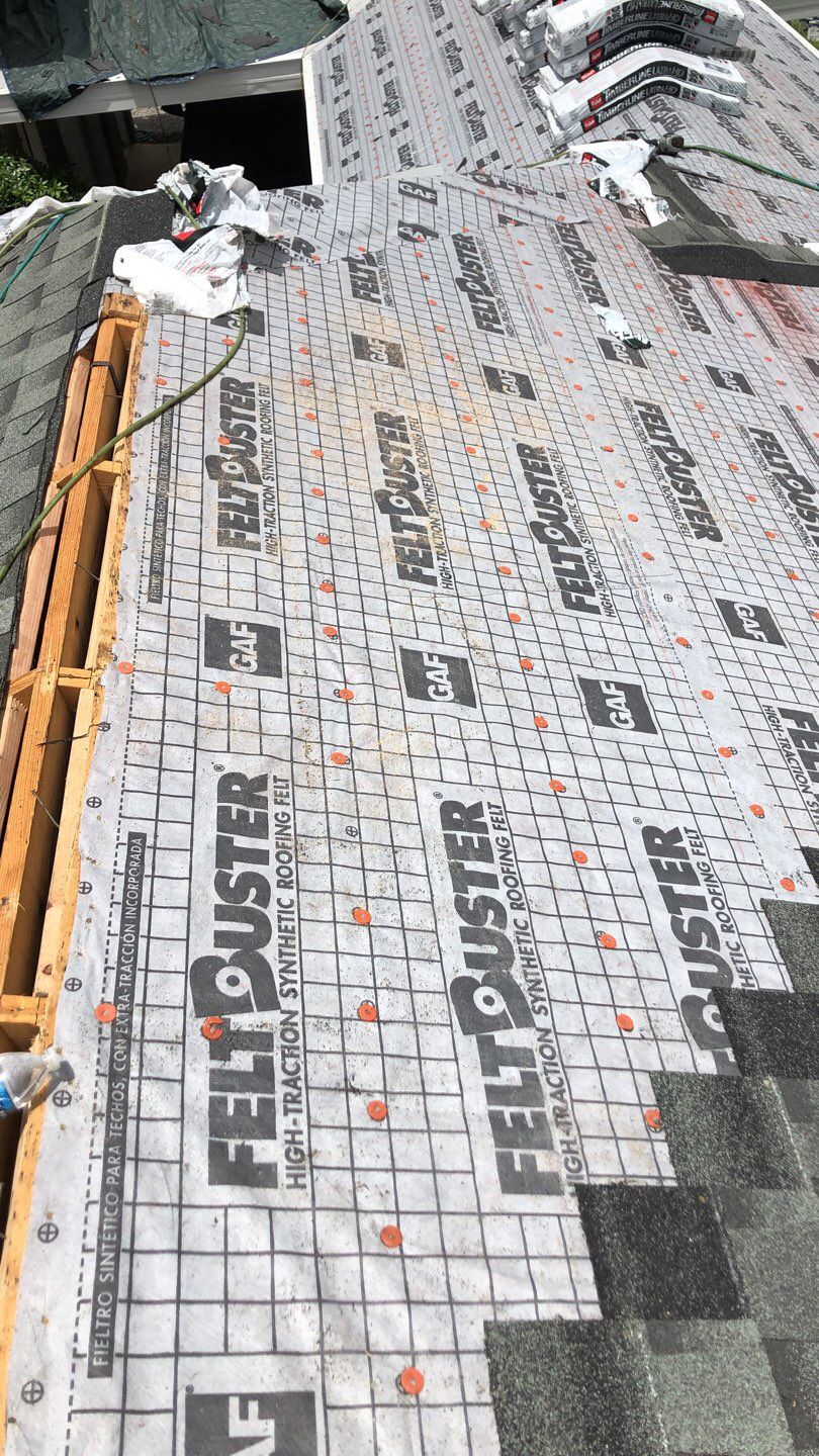 Residential Roofing Installation using Roof Replacement by American Roofing & Construction LLC