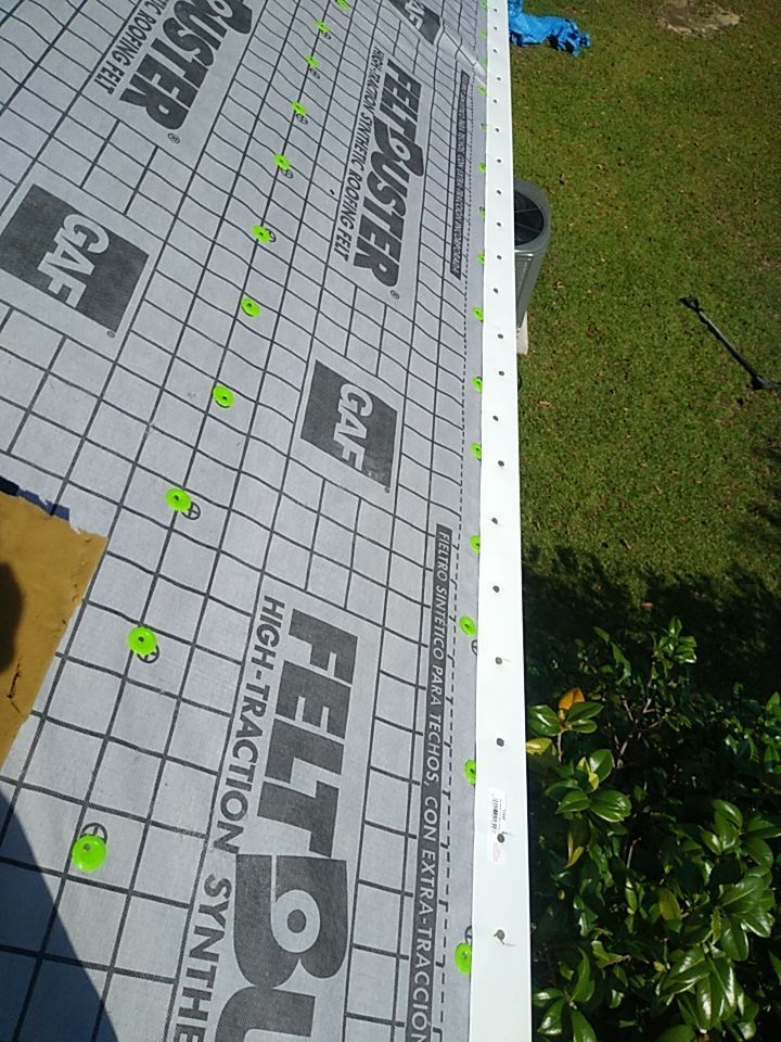 Residential Roofing Installation using Roof Replacement by American Roofing & Construction LLC