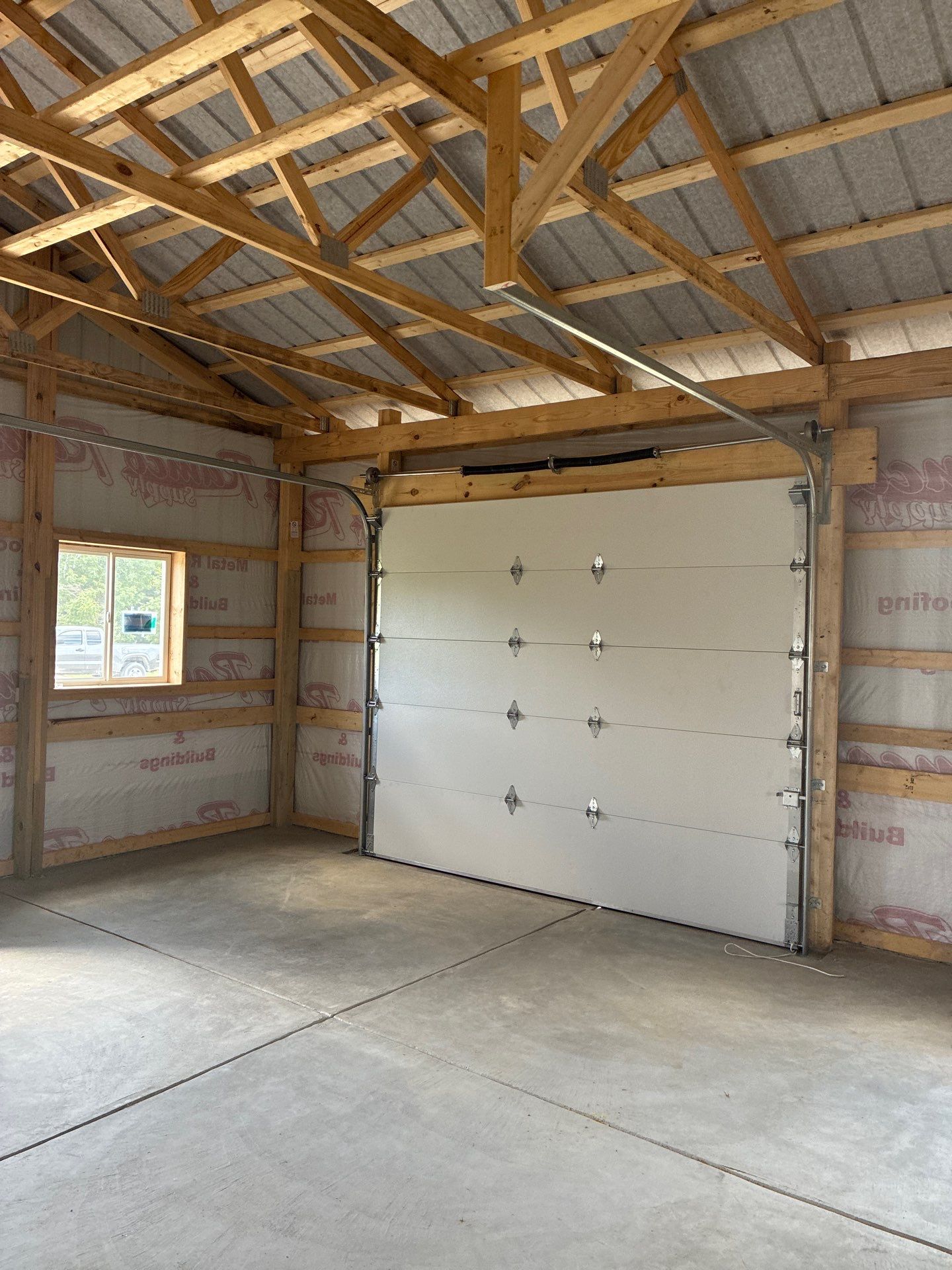 Custom Post-Frame Pole Barn with Concrete Floor in Greenfield by The Barn Builders