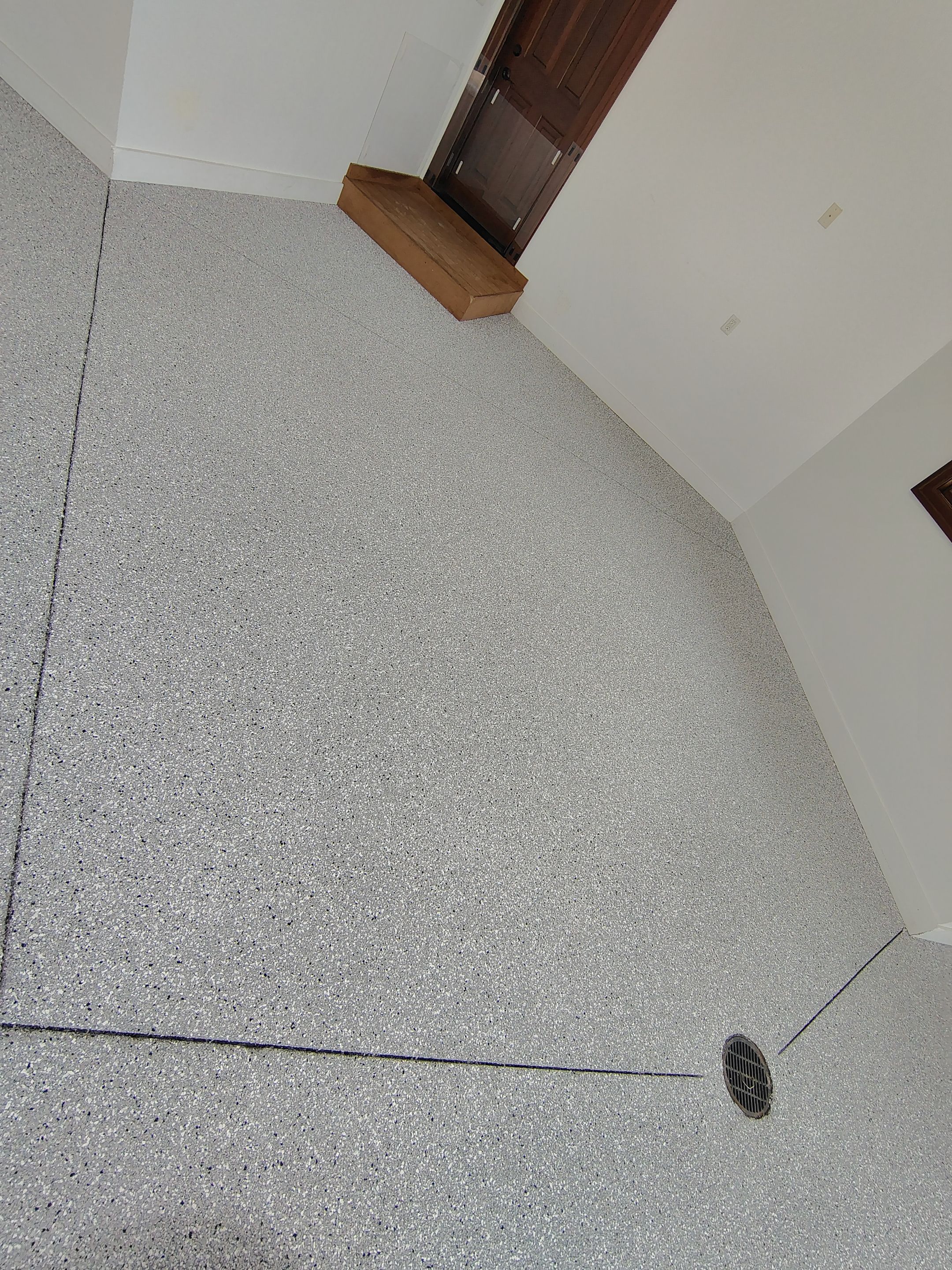 Feather Grey Floor Coating in Sioux Falls, SD by Select Painting, Coatings & Garage Cabinets