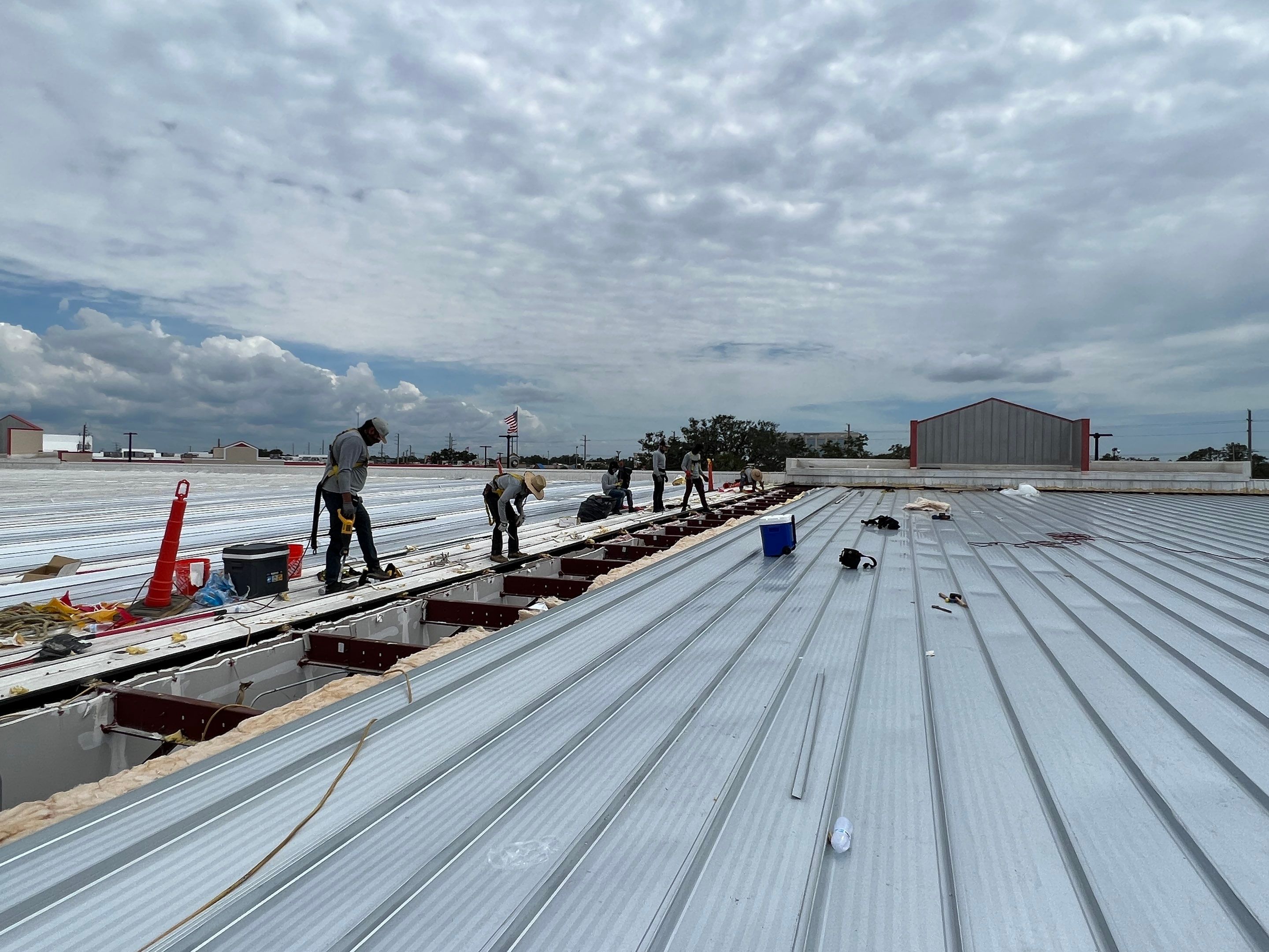 Commercial Metal Roof Replacement at Shopping Plaza in Port Charlotte by CES Roofing
