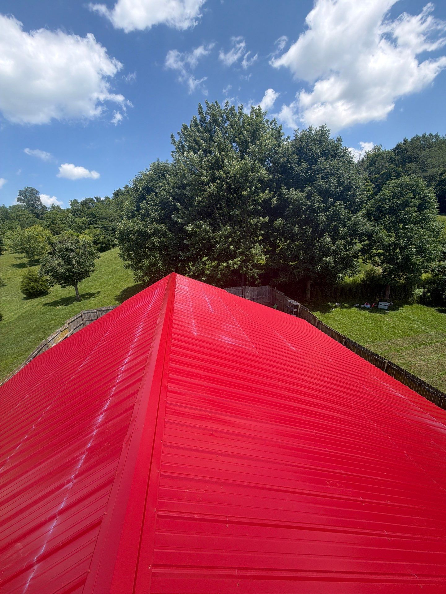 Classic Rib Metal Roofing - Dark Red by Hoel Roofing & Remodeling