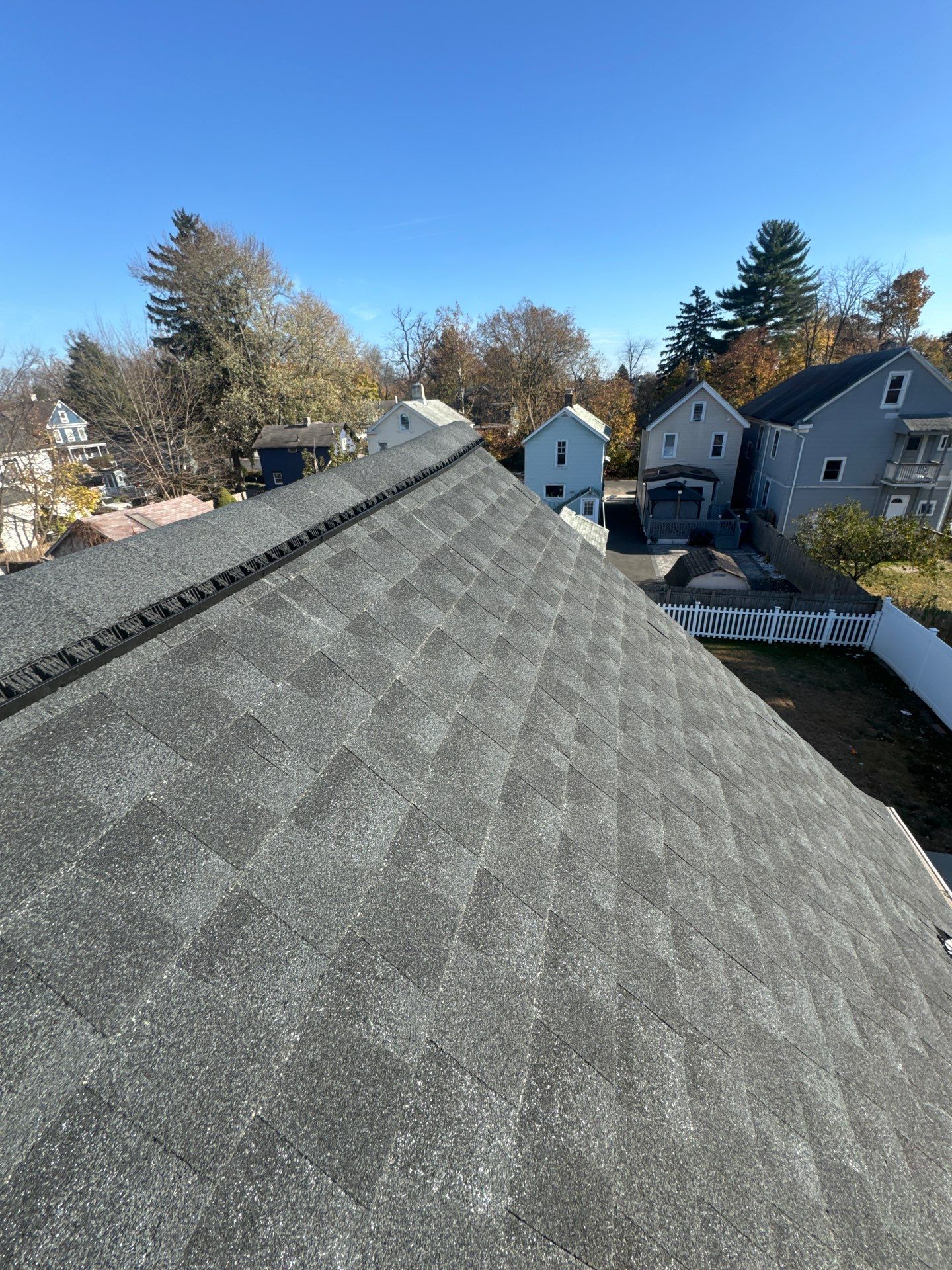 Estate Gray Shingles by Reimagine Roofing