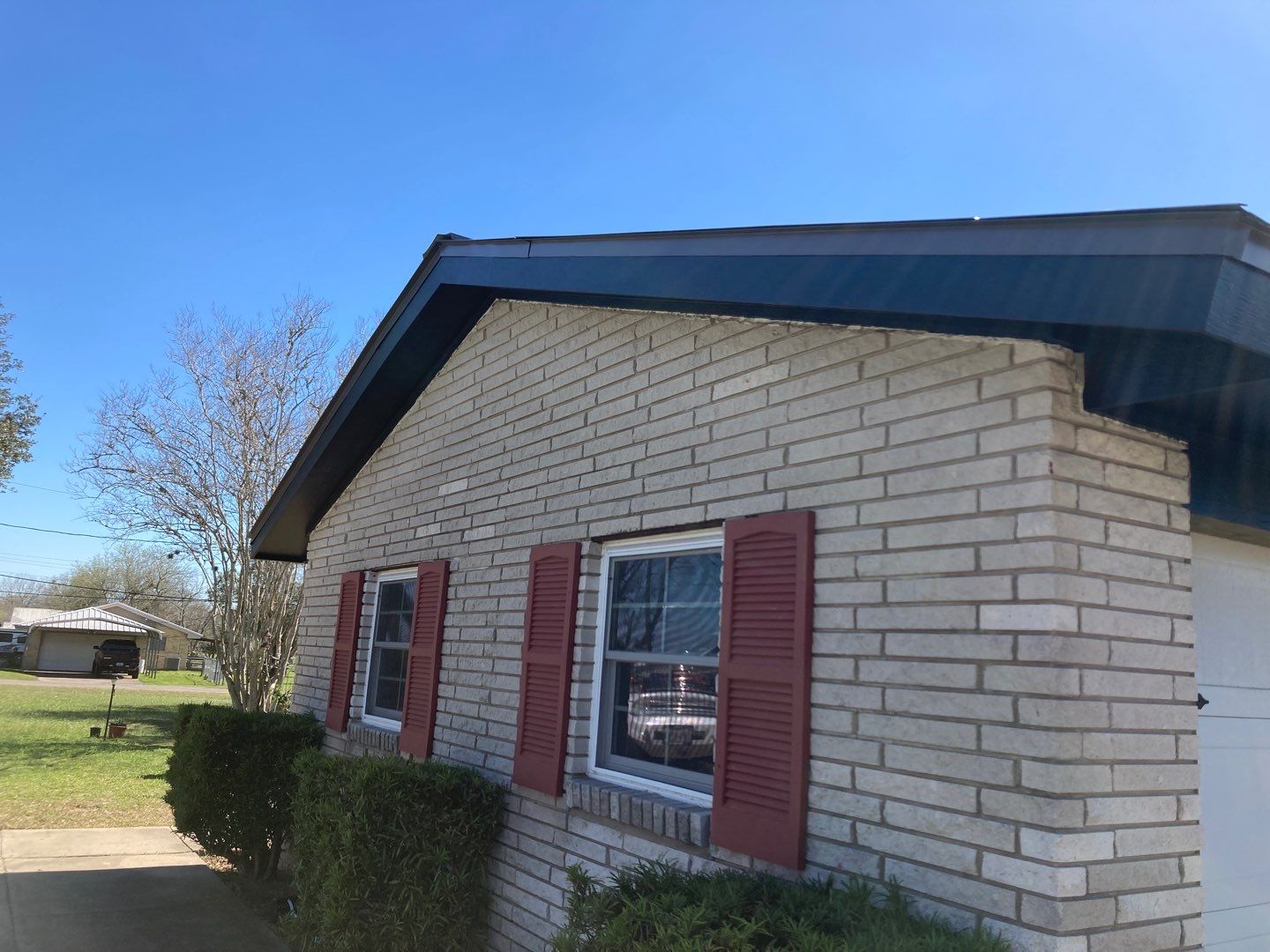 Beeville Backporch sittin' by Bayfront Roofing and Construction