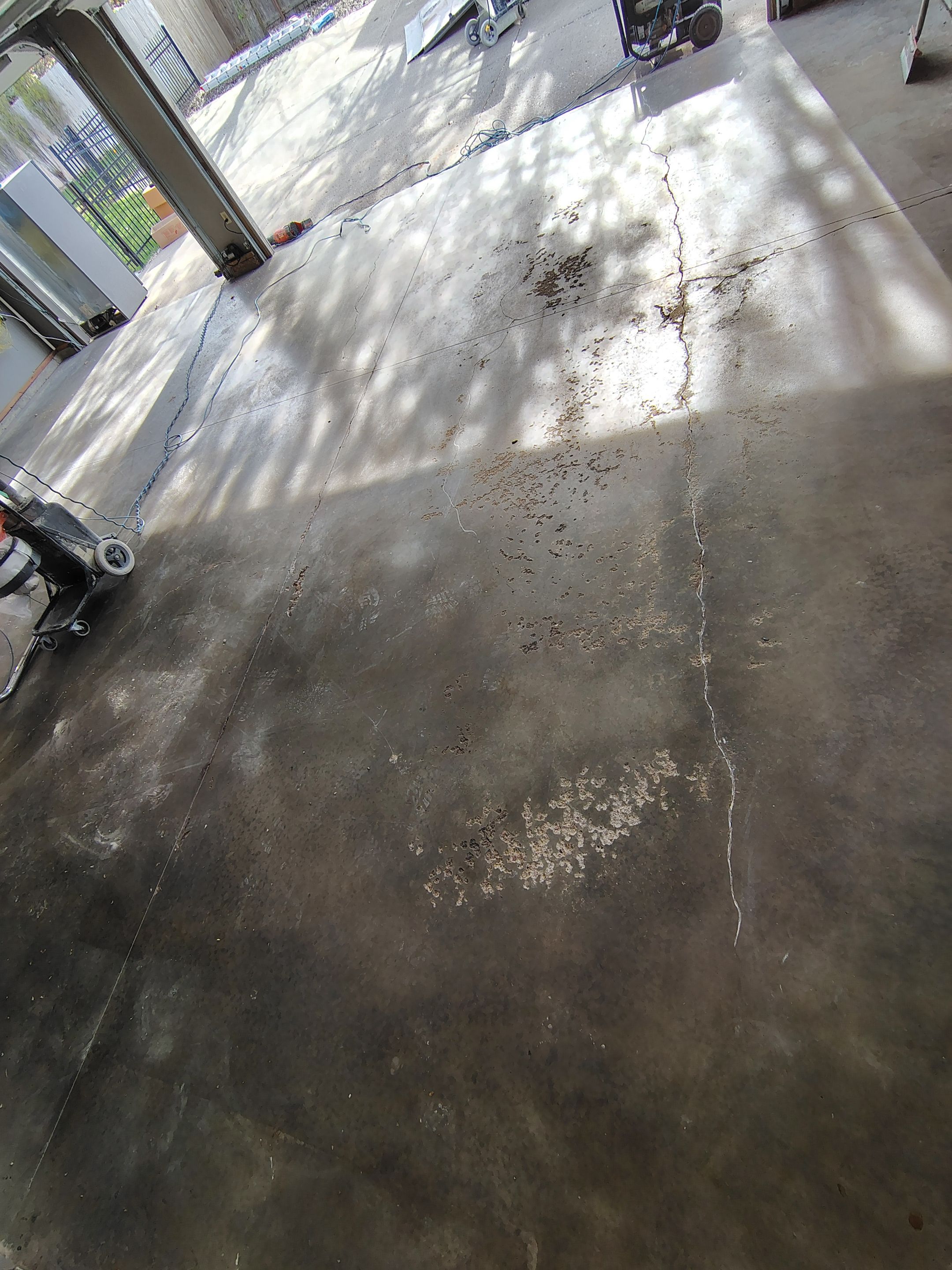Garage Floor Concrete Coating and Crack Repair in Sioux Falls by Select Painting, Coatings & Garage Cabinets