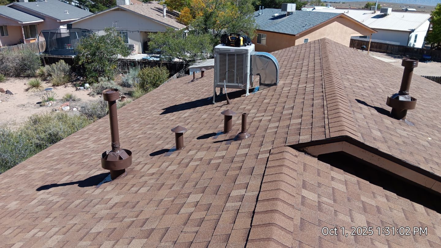 Oakridge Desert tan shingles in Chimayo Meadows by Doyle Roof Masters Inc