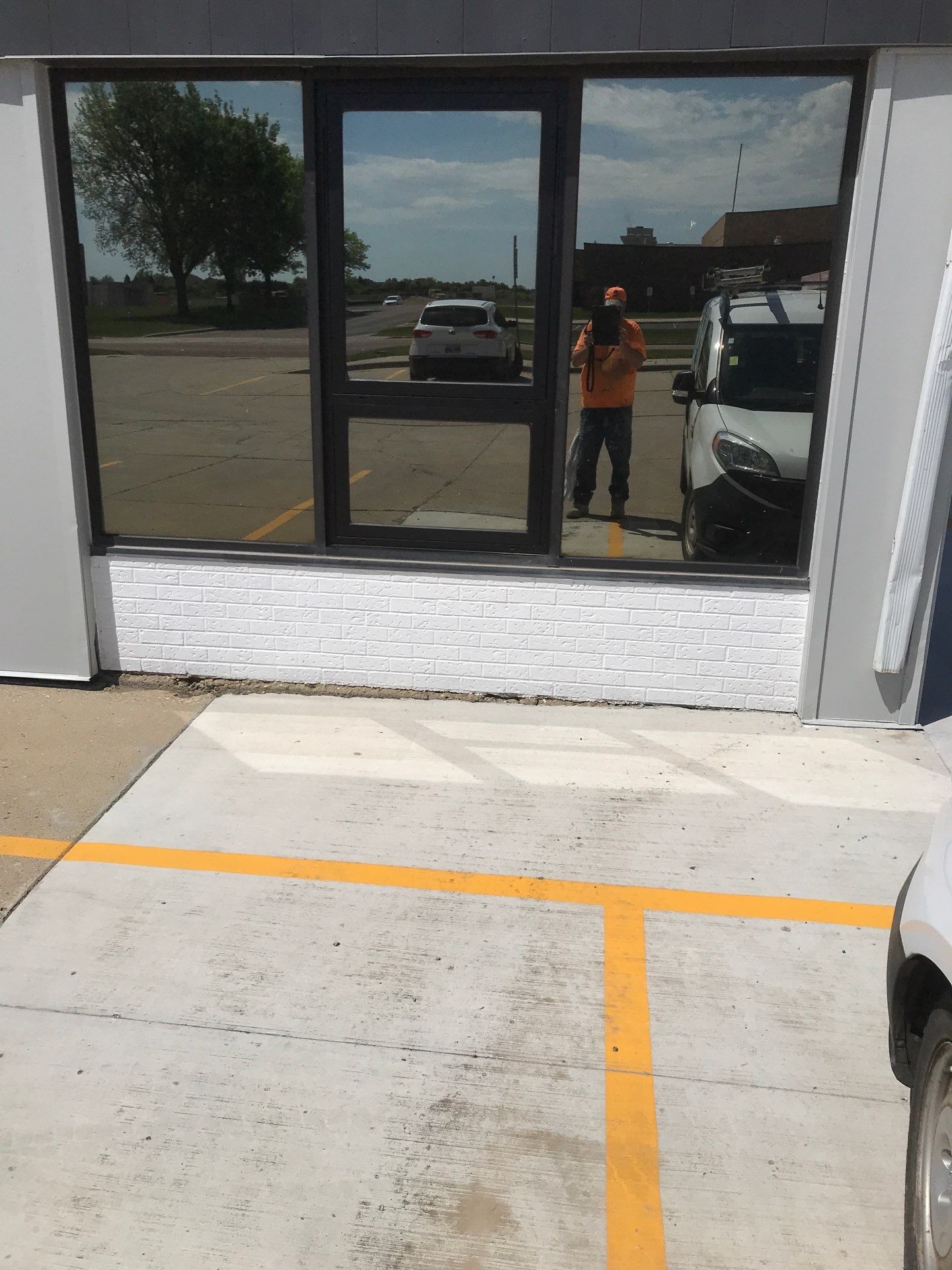 Commercial Shop Renovation and Concrete Parking Installation in Brookings by Select Painting, Coatings & Garage Cabinets
