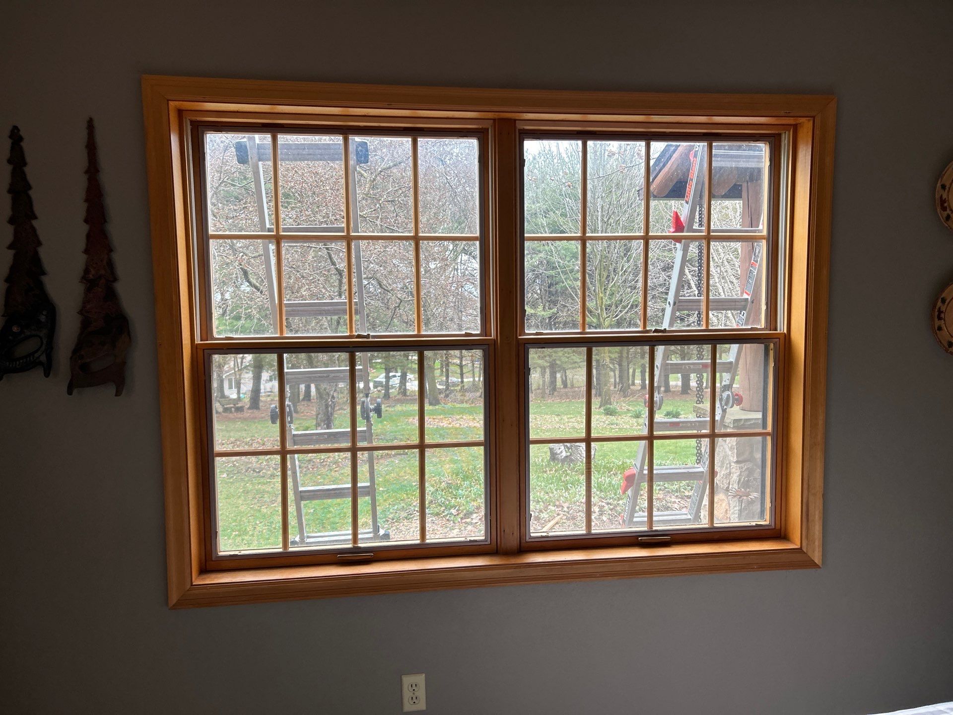 Pella Window installation using Pella Lifestyle wood/Aluminum window by United Windows and Siding LLC
