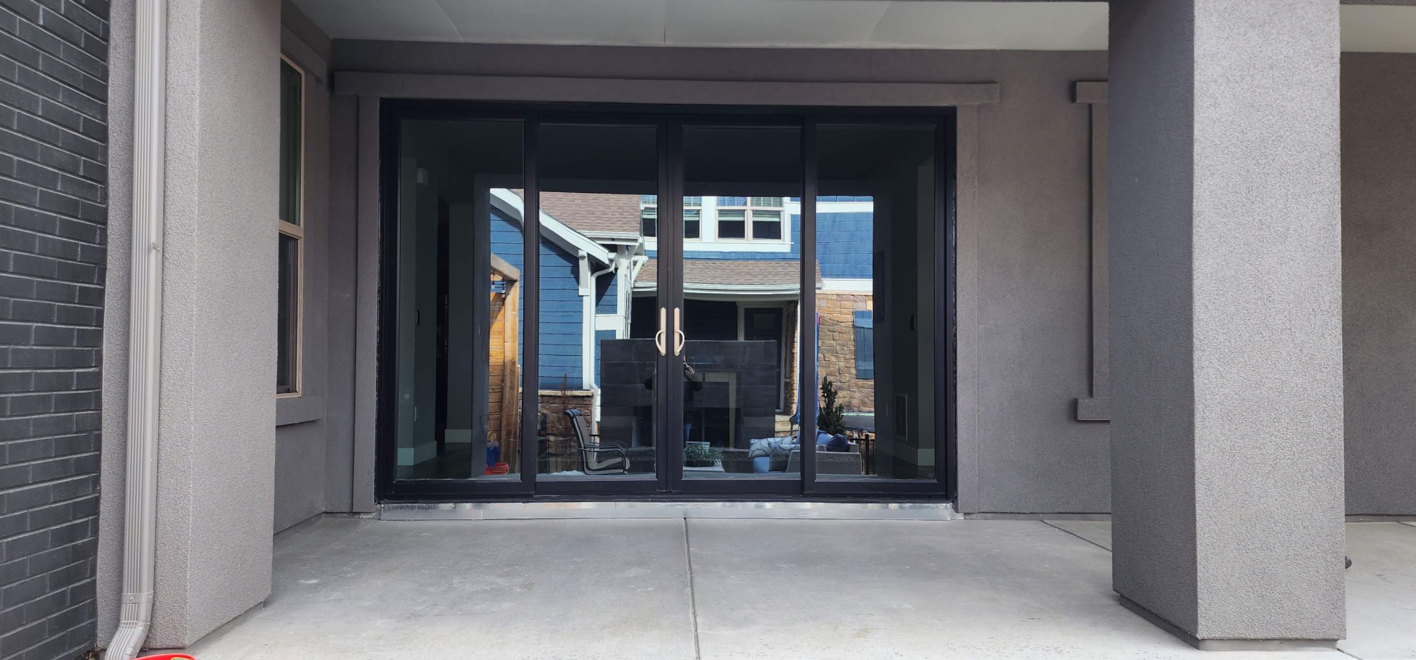 Open your space up to the outside! 4 Panel Patio door replacing 2 windows by 1st choice windows and siding