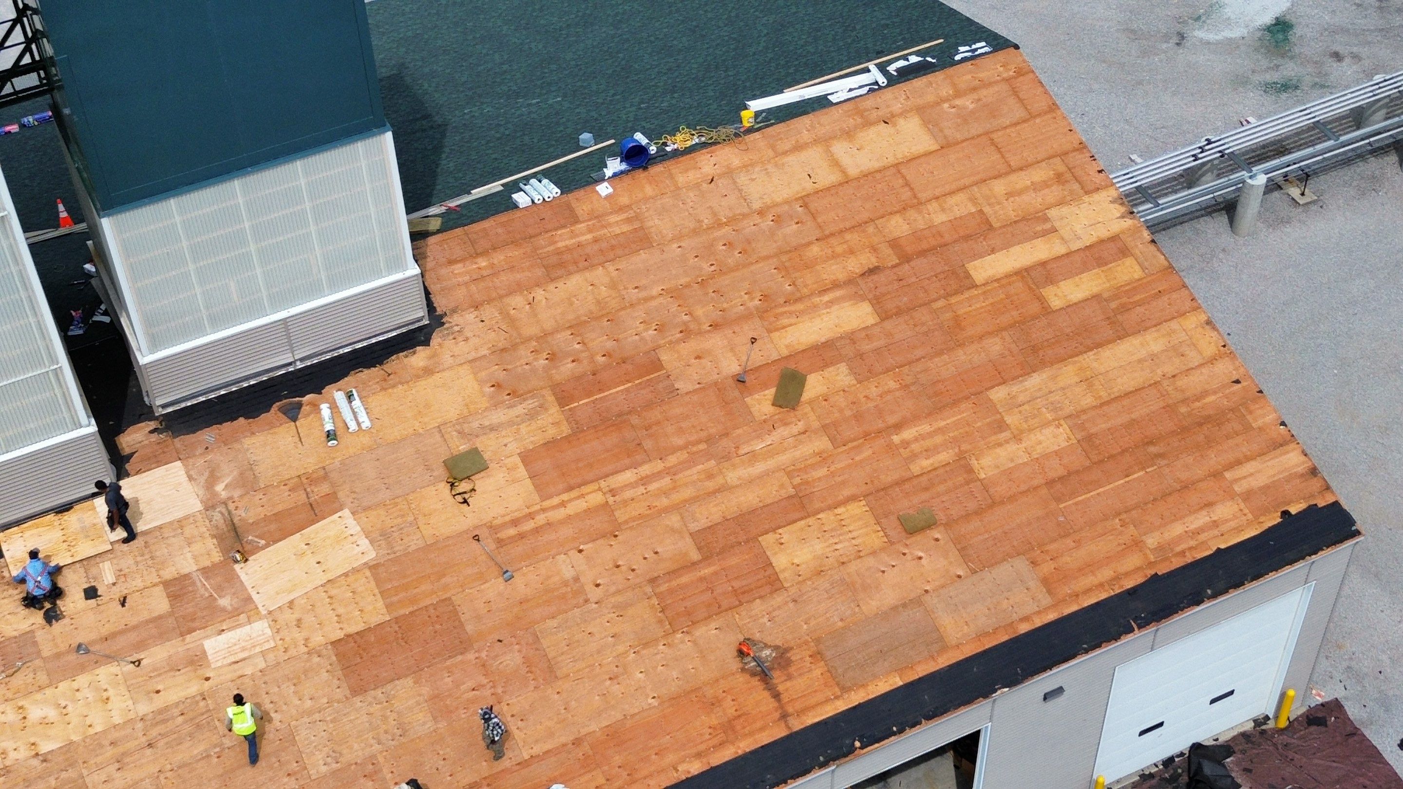 Commercial Roofing Installation using Timberline HDZ Shingles - Hunter Green by RoofX 