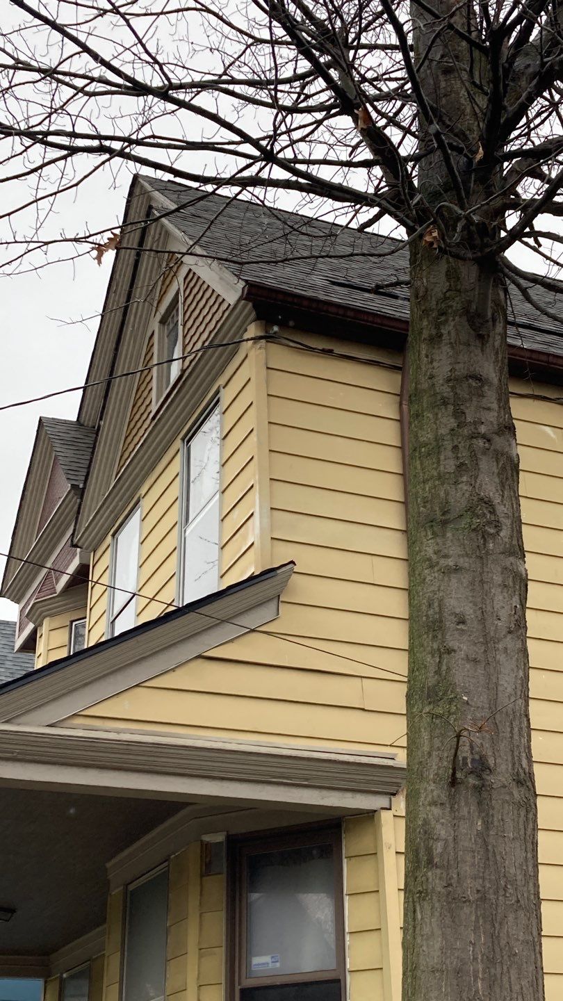 James Hardie Siding on Antique Home by Absolute Roofing and Construction