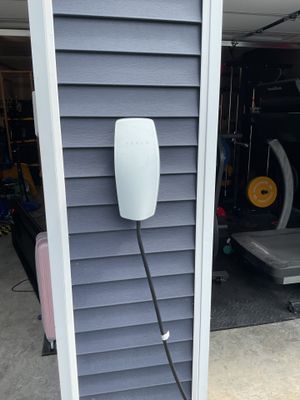 Sleek Tesla Charger Installed for Residential EV Power