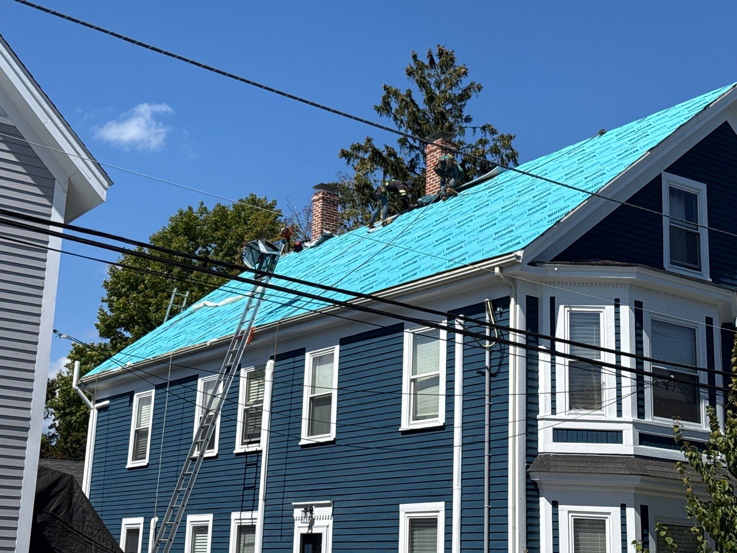 Half Roof Replacement for Solar Installation – Townhouse with New Plywood Decking by Sensible Home Solutions