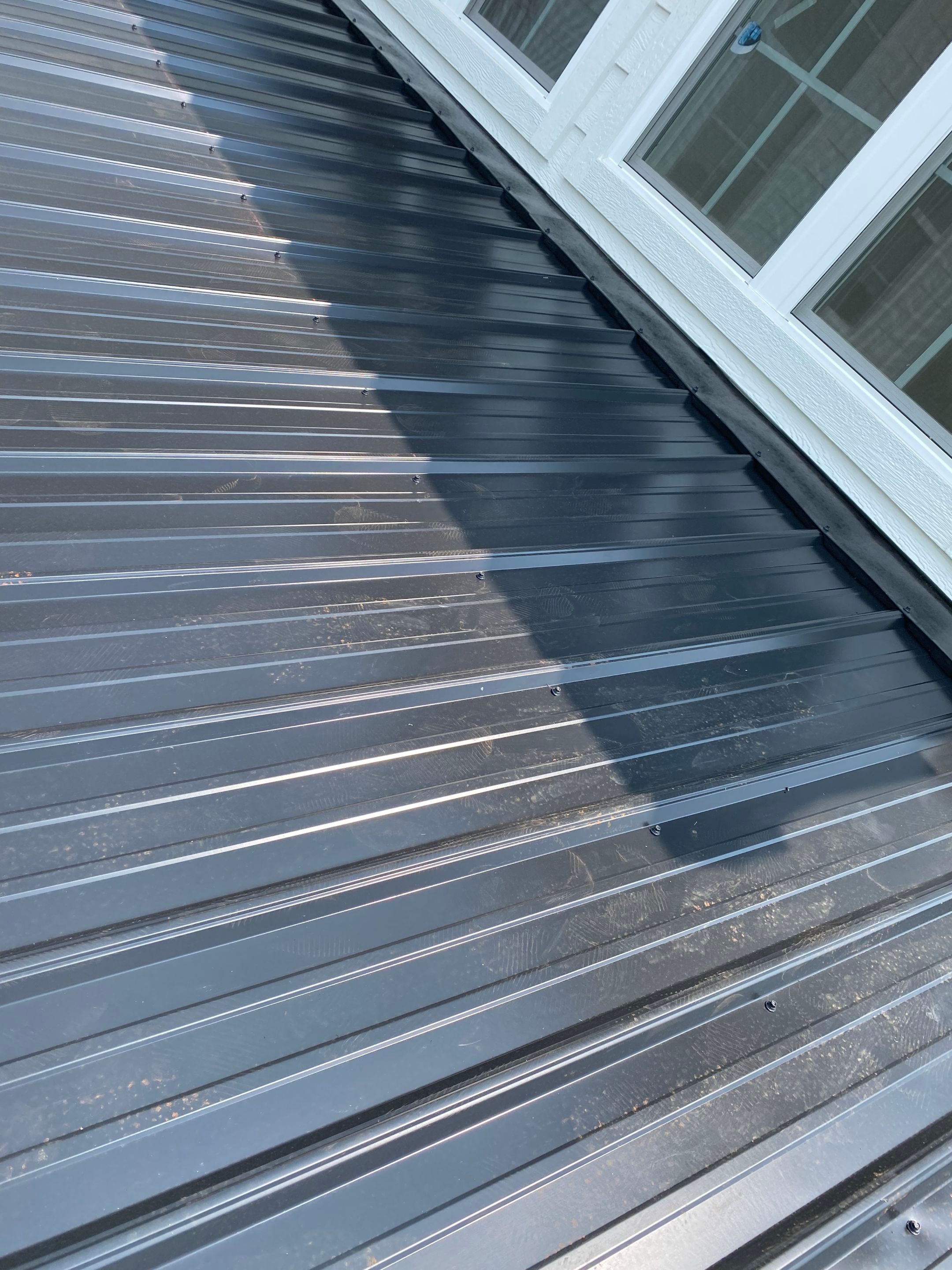 Jason's metal porch roof by BROCK BUILDERS 