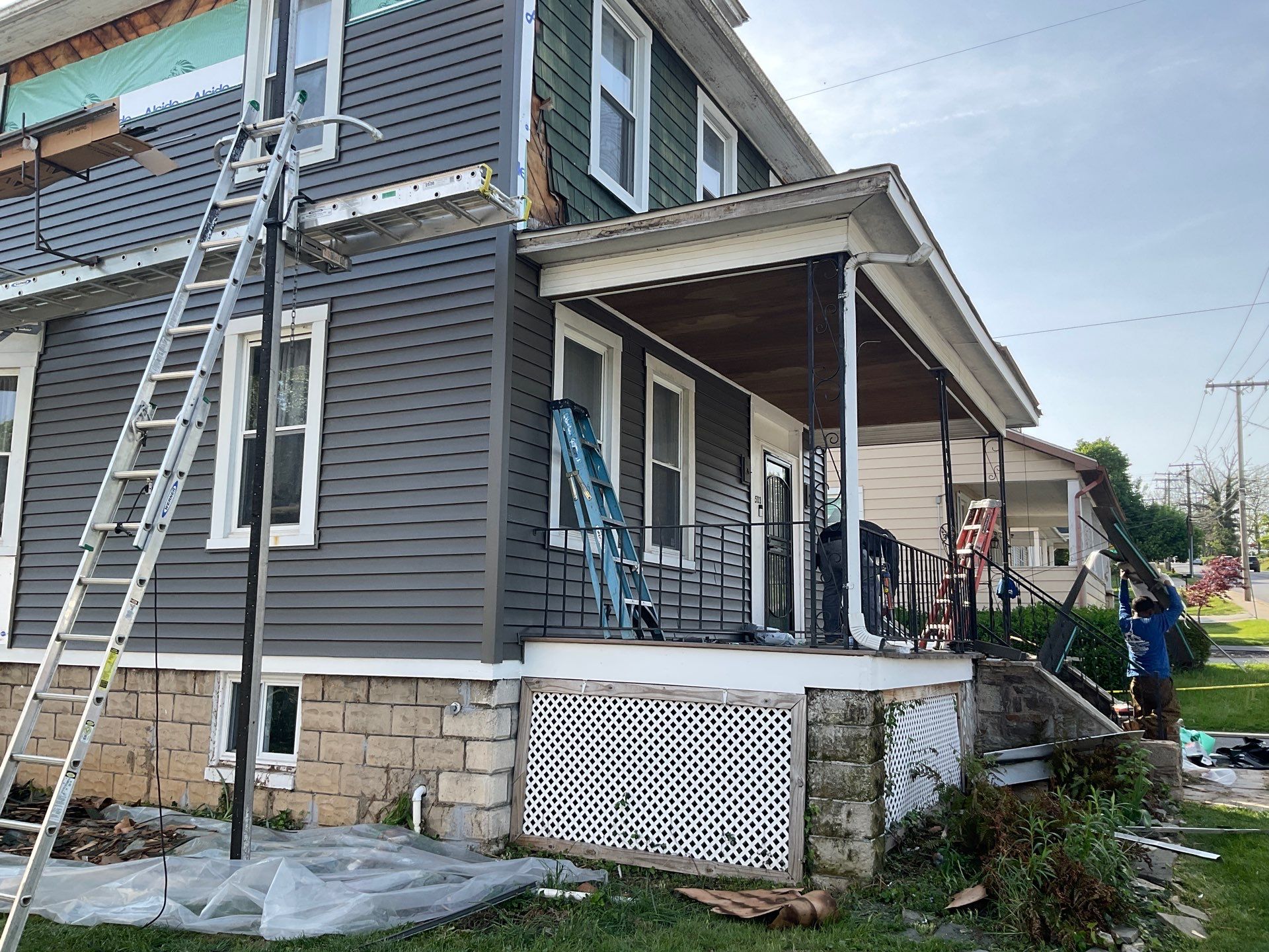 New siding & New Gutters by Alpha Design Services