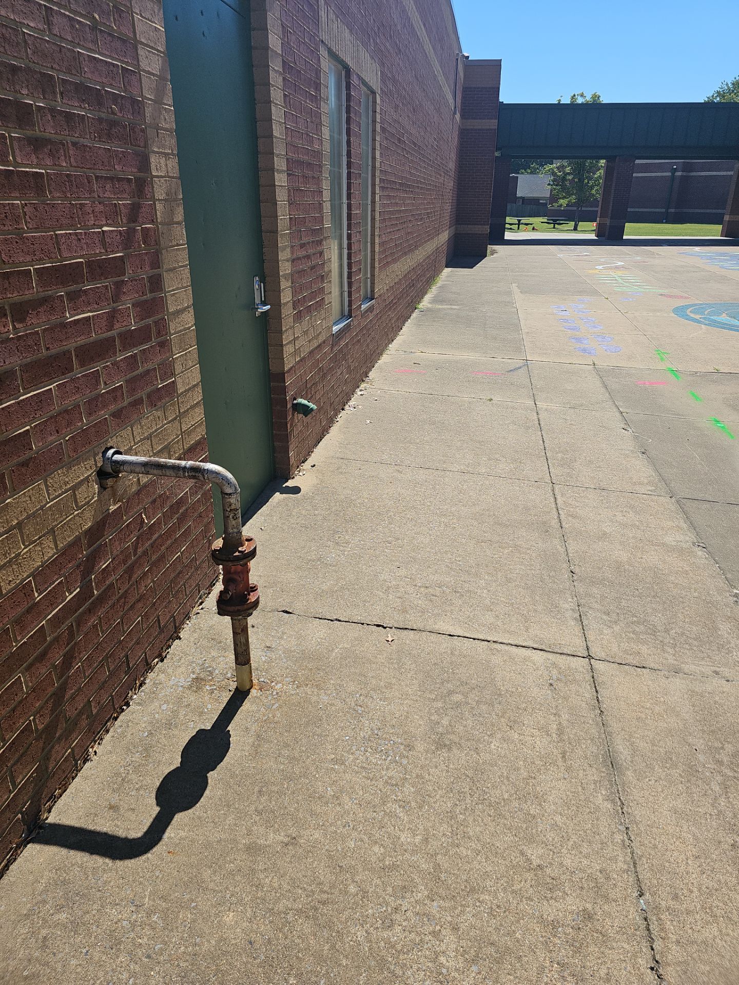 Utility Locating at a school for fence install by Alsip Locating Service, LLC