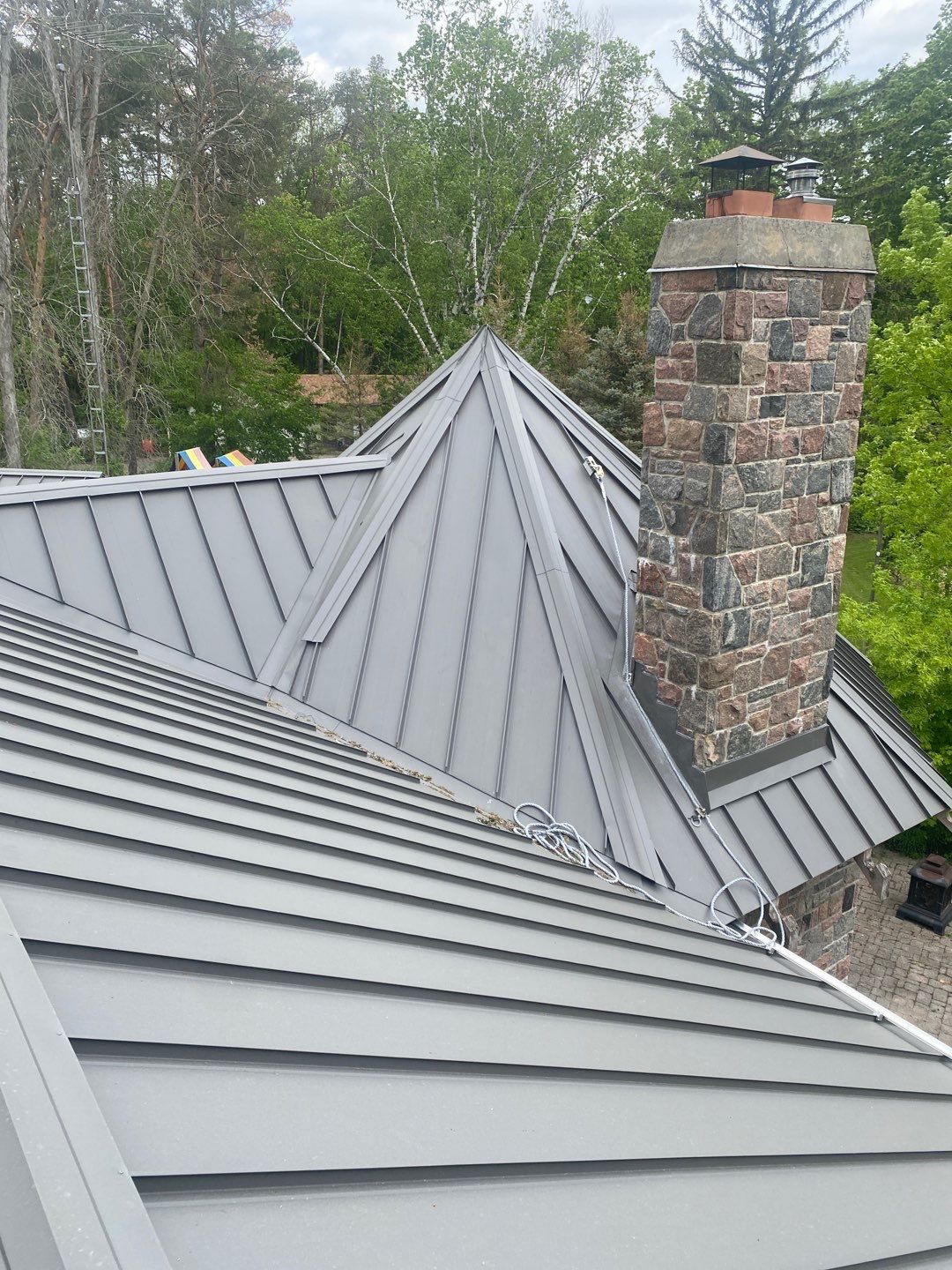 New Roof Installation using 16" Standing Seam Panels by Jay Carter Roofing & Sheet Metal