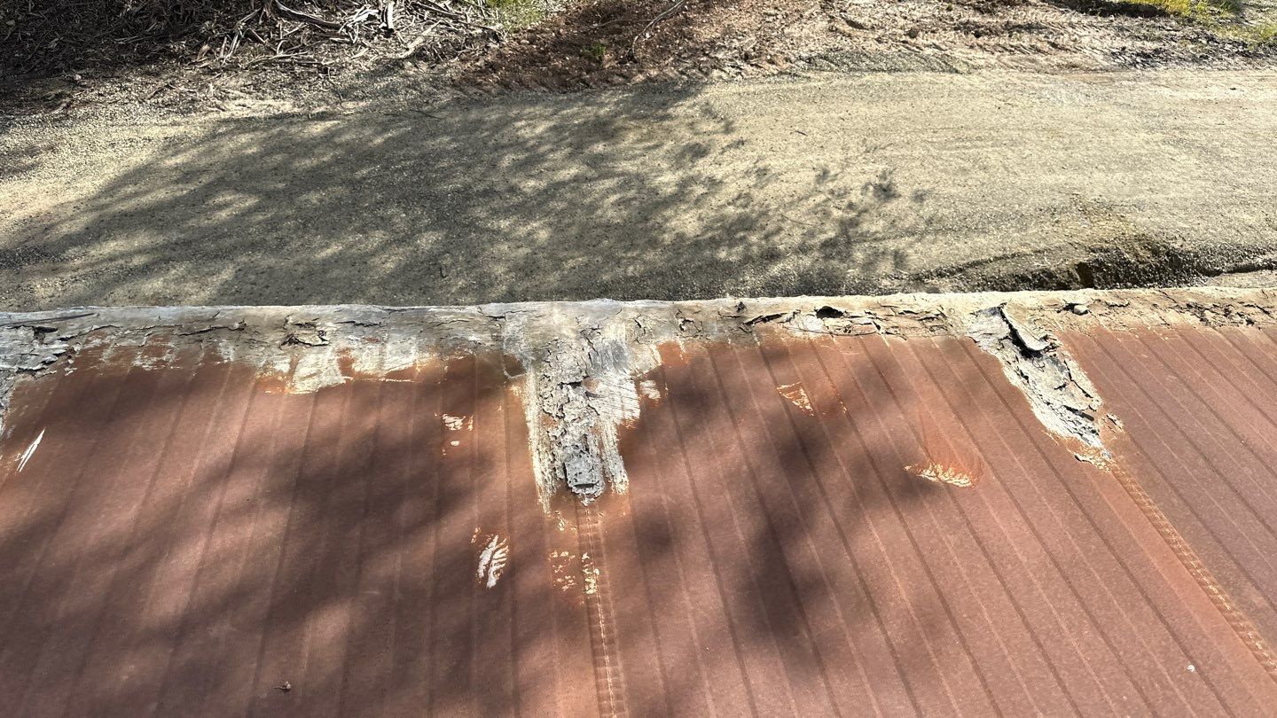 Foam and coatings on mobile home by Straight Edge Roofing Inc