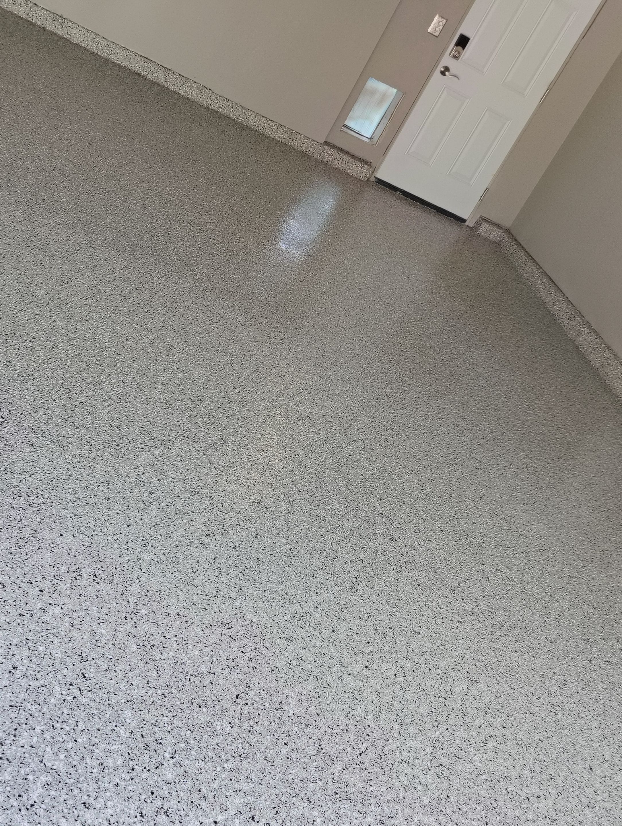 Garage Floor Coating with Decorative Flakes in Tea by Select Painting, Coatings & Garage Cabinets