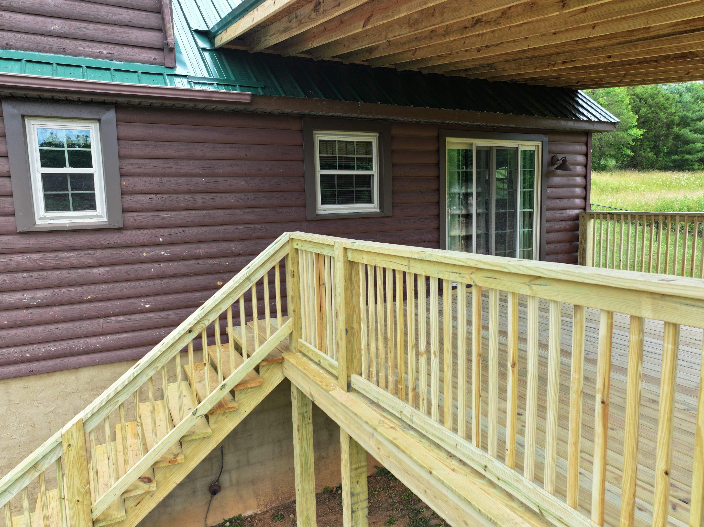 Paddle Creek Pet Ranch Cabin  by Omnia Roofing