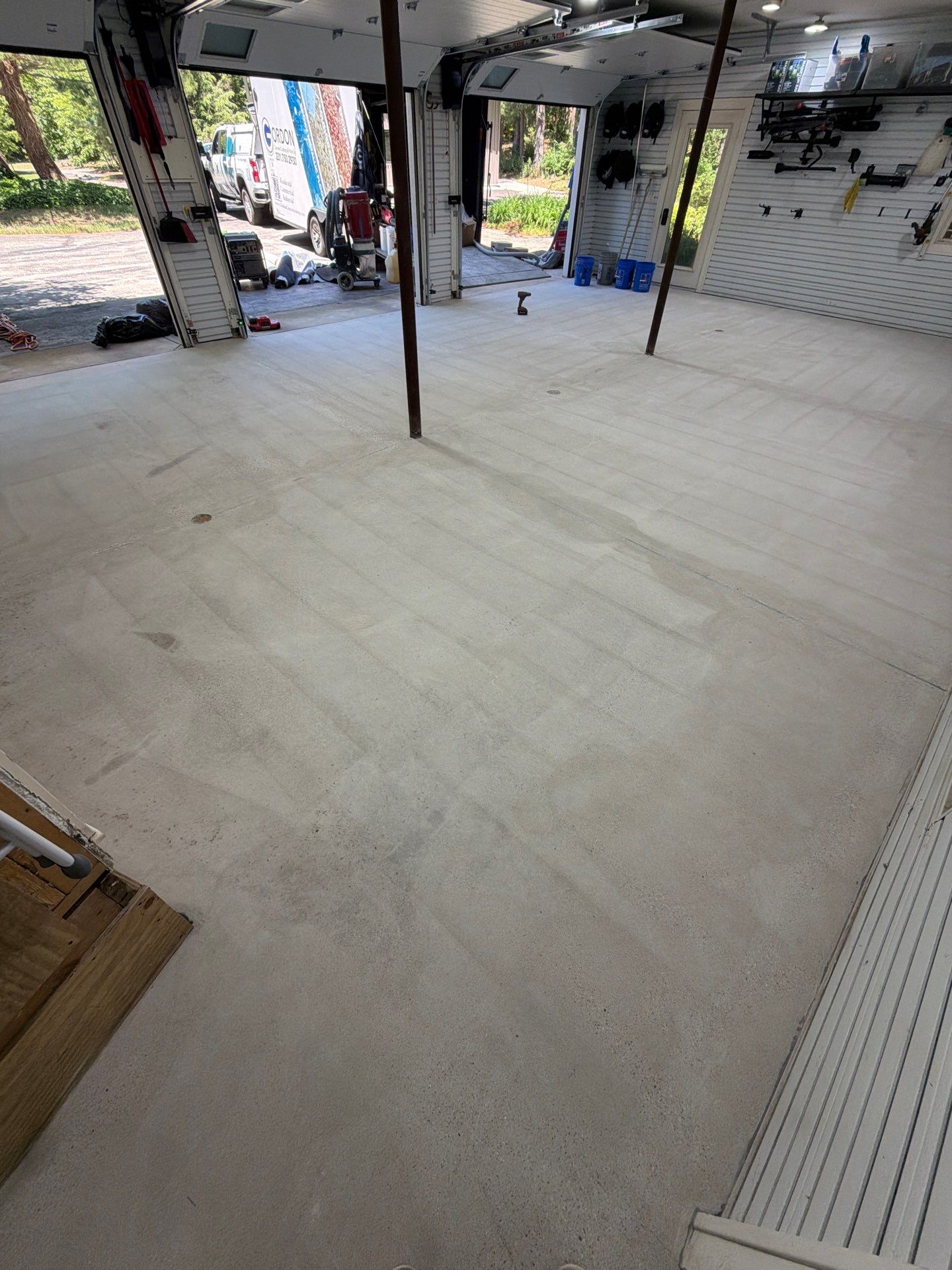 Residential Garage Epoxy Flake Floor Installation in Grand Haven by Gordon Painting