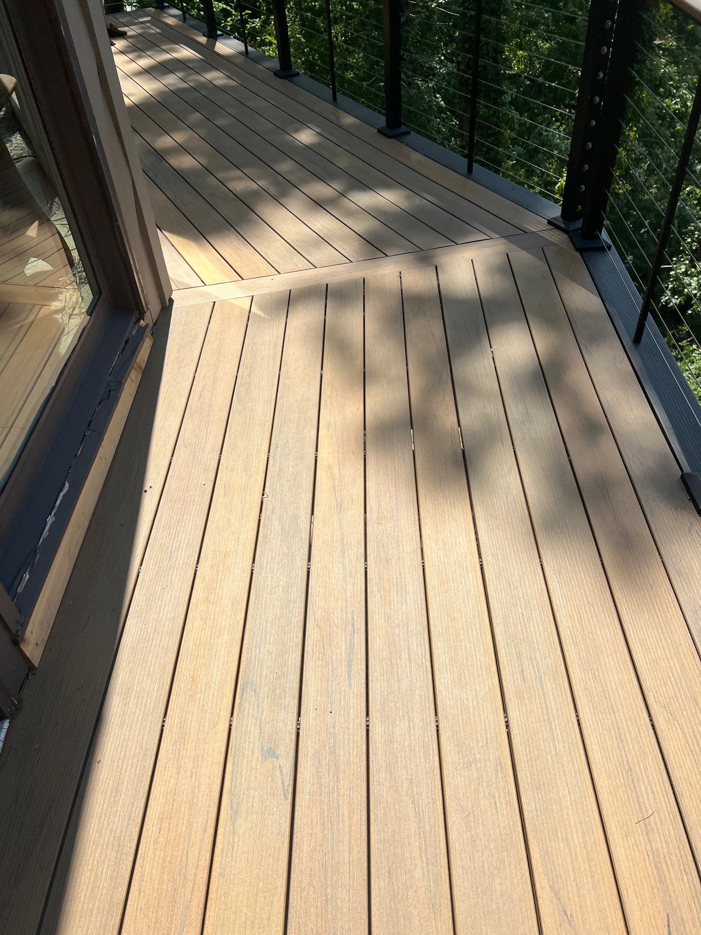 TimberTech Deck Replacement with Metal Cable Railing in Atlanta, GA by Nelson Exteriors