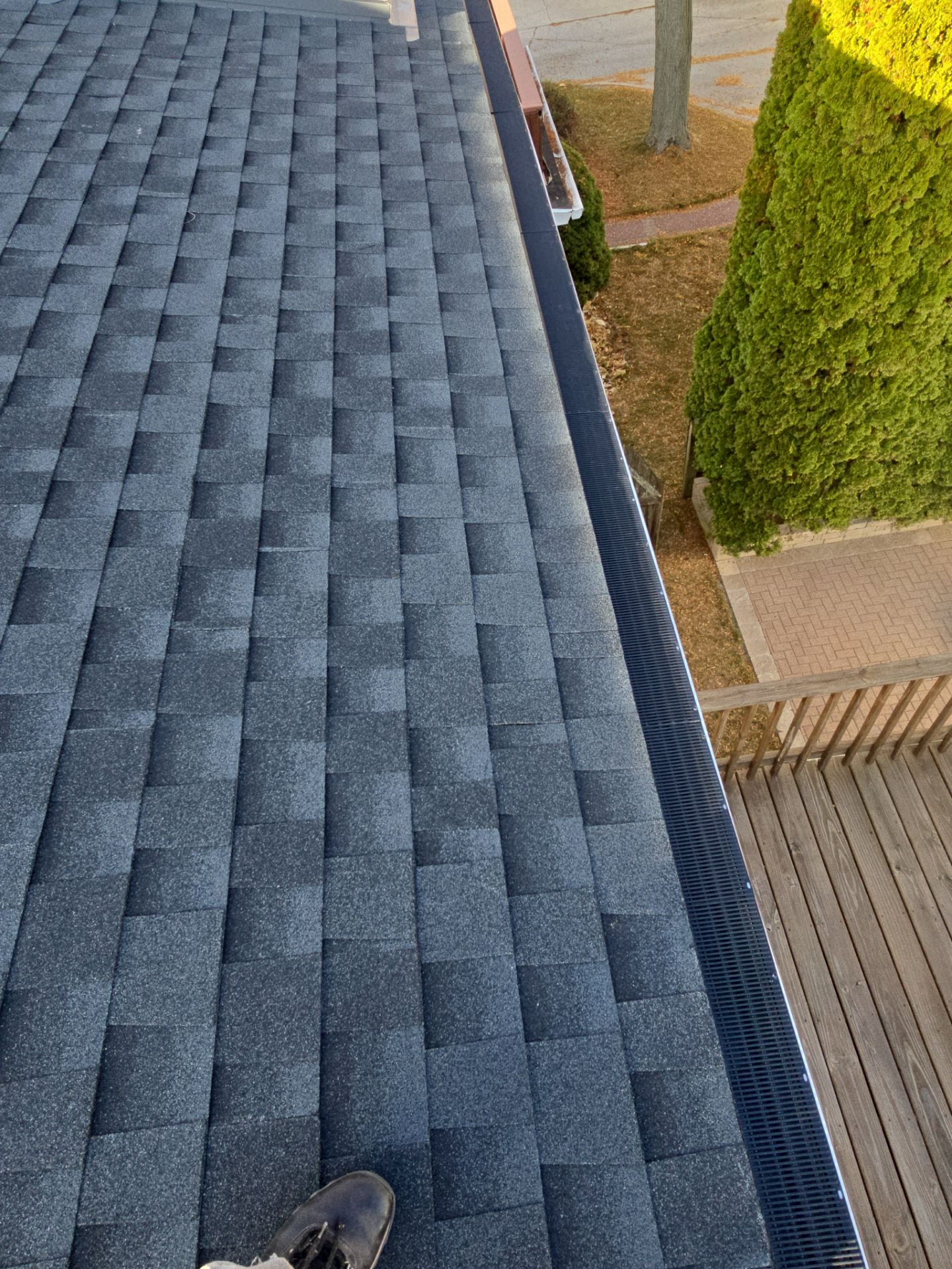 House, Garage, and Skylight Roof Replacement with GAF HDZ Charcoal Shingles and Gutter Protection by Gellings Roofing & Siding
