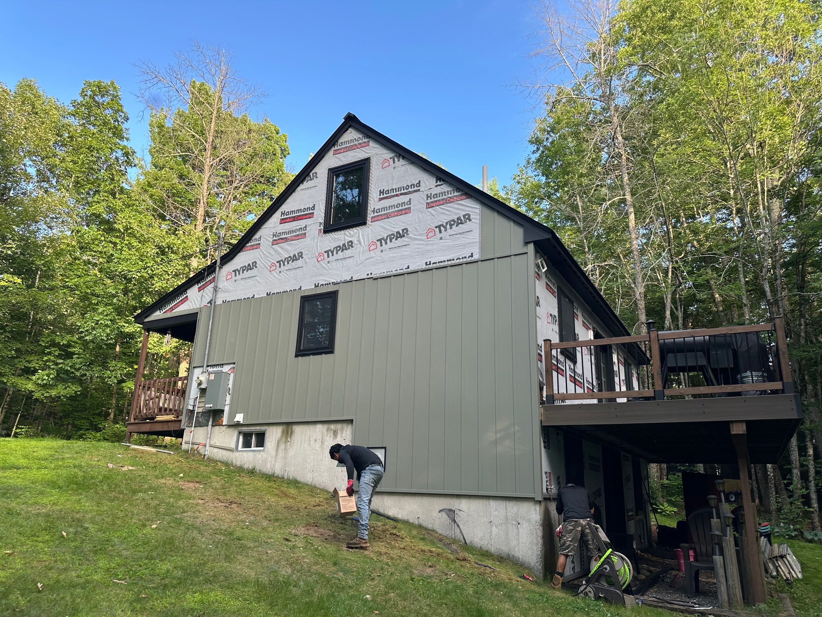 Sage Green Board and Batten Siding and Deck Upgrade in Standish by Tall pine roofing