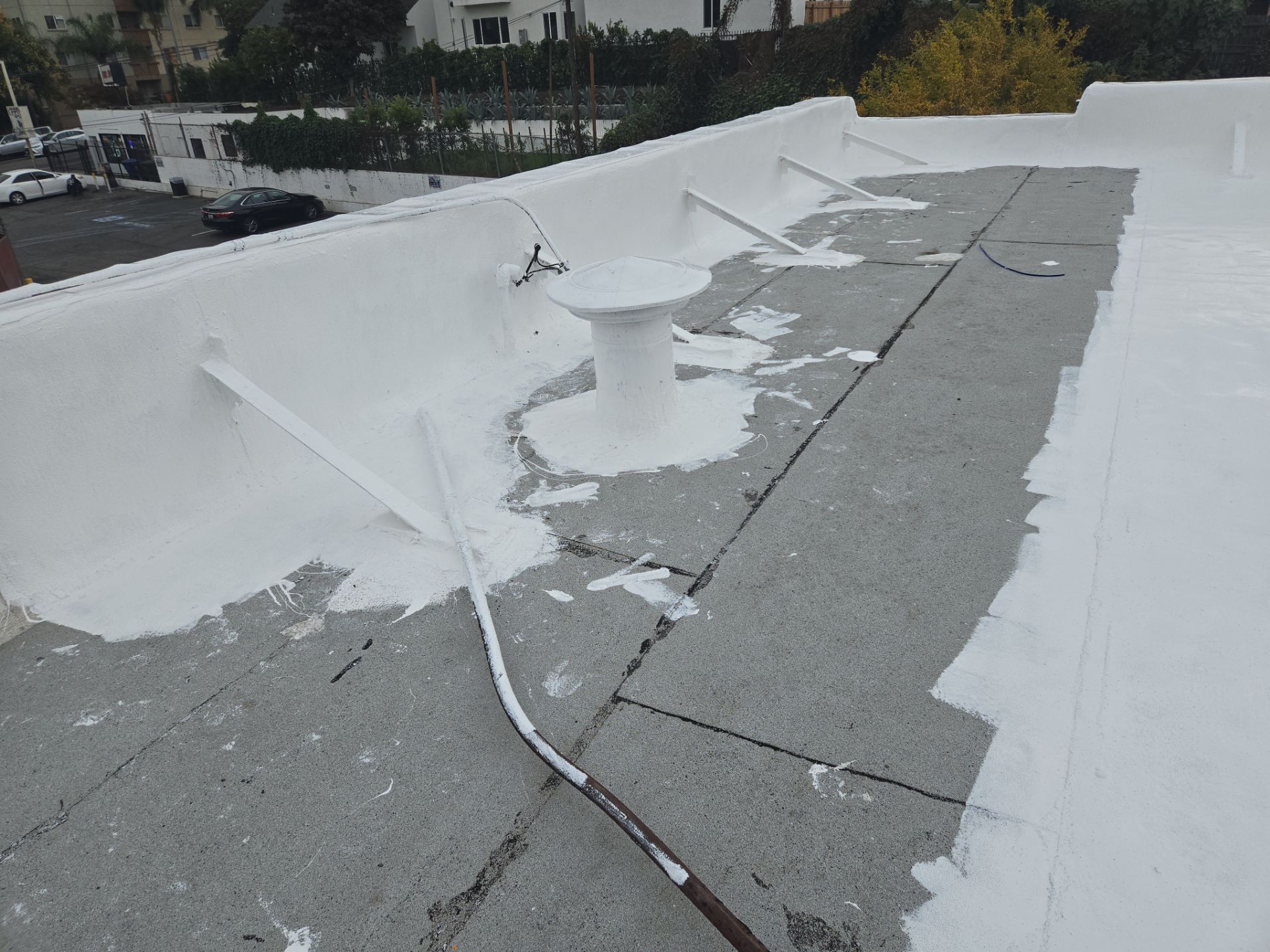 Commercial Roofing Installation using ASC Silicone Membrane by Hull Brothers Roofing