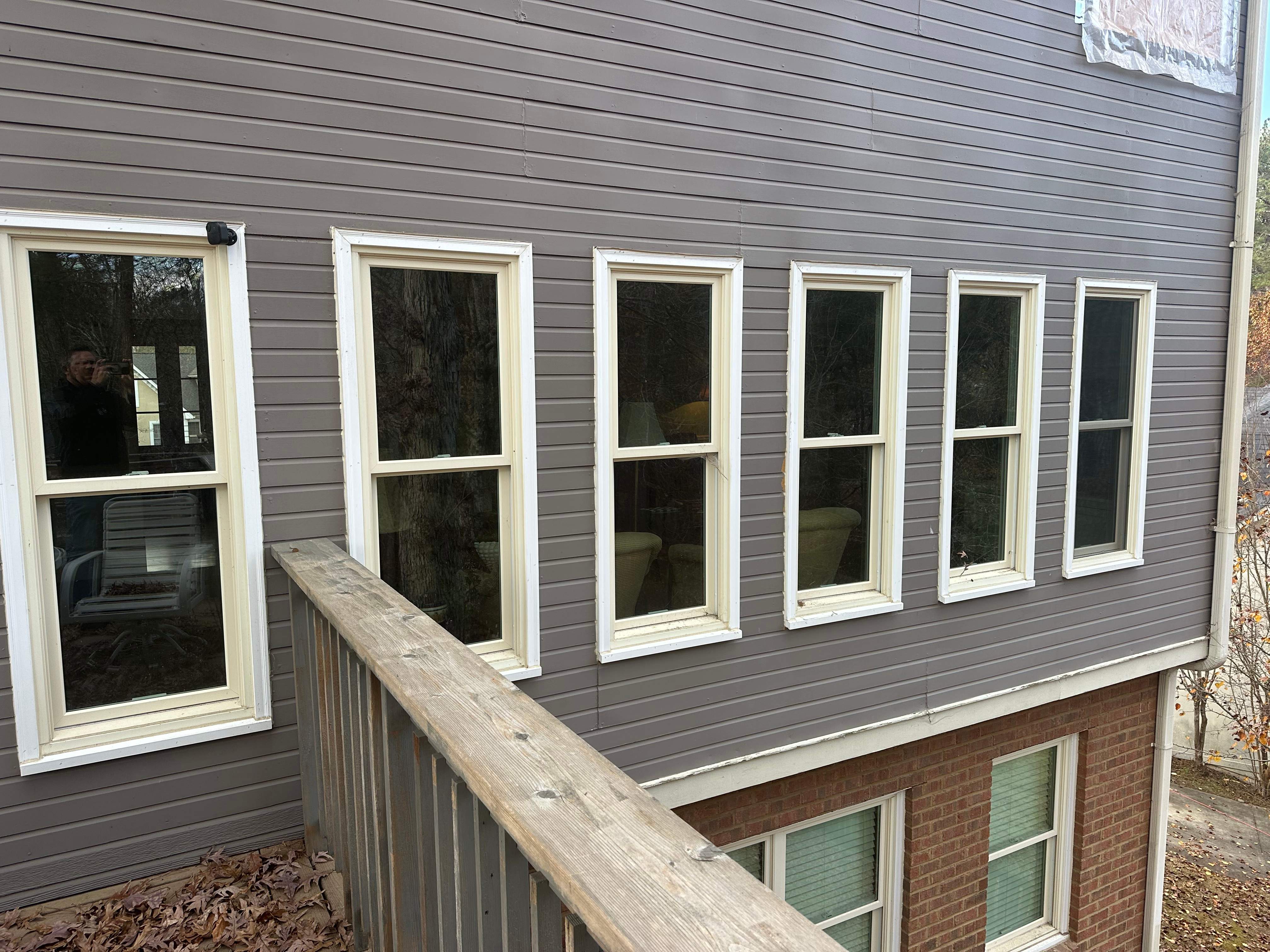 James Hardie Siding Replacement, Exterior Painting, Deck Stain, and Gutter Installation in Peachtree Corners, GA by Nelson Exteriors