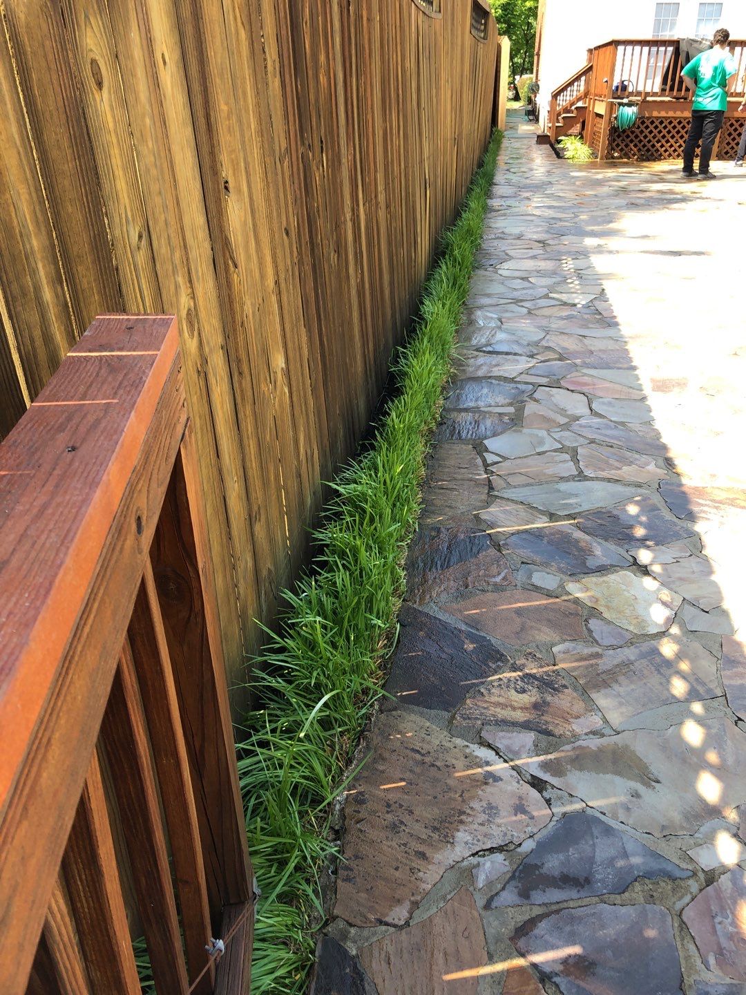 Liriope grasses, mulch and stone pavers by GrassBusters, Inc.
