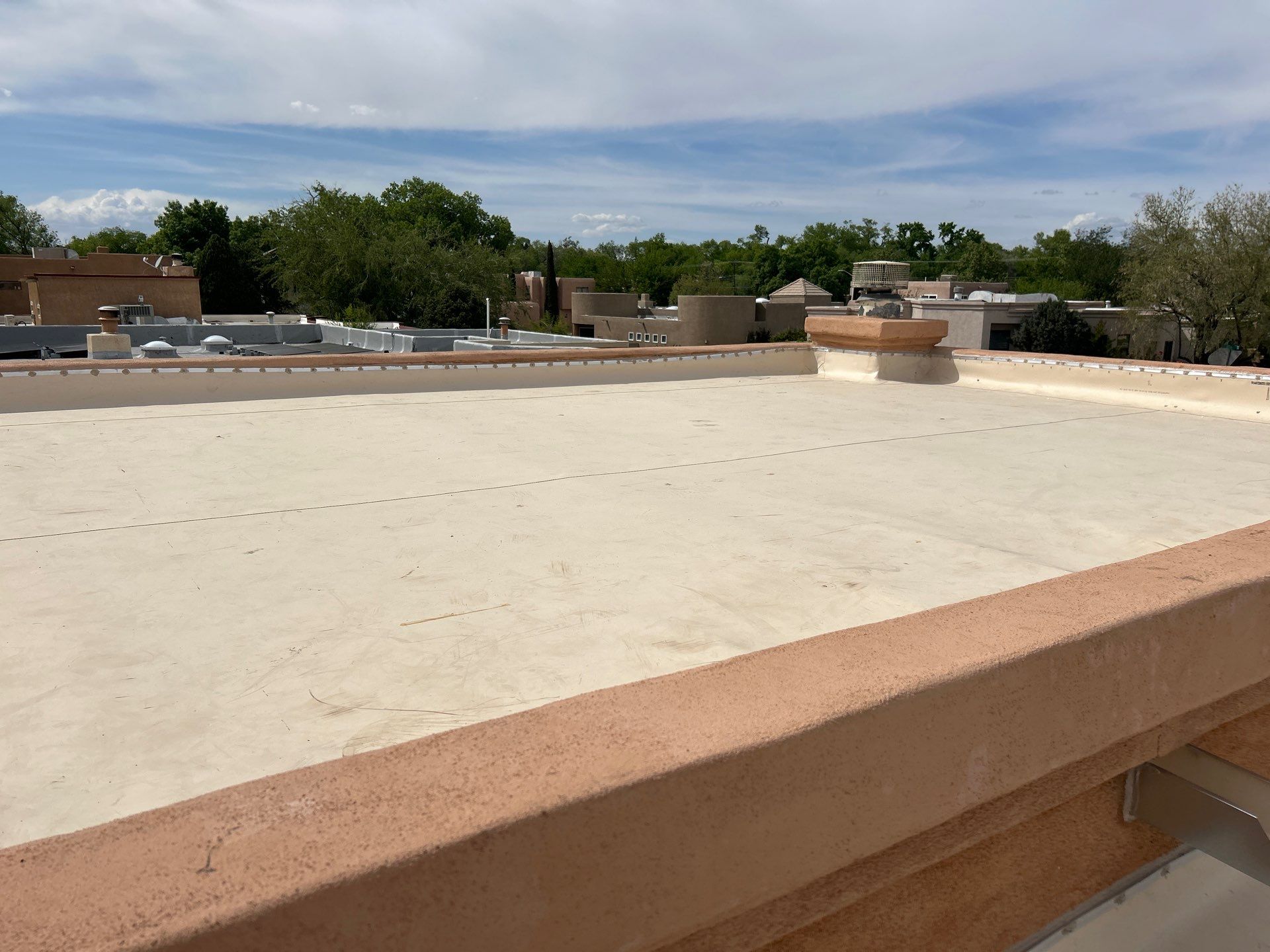 Residential TPO Flat Roof Replacement and Skylight Installation in Albuquerque by Doyle Roof Masters Inc