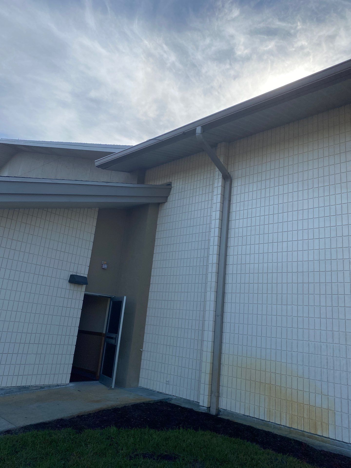 Grey Aluminum Gutters with Downspouts in Sarasota FL by Gutter Professors