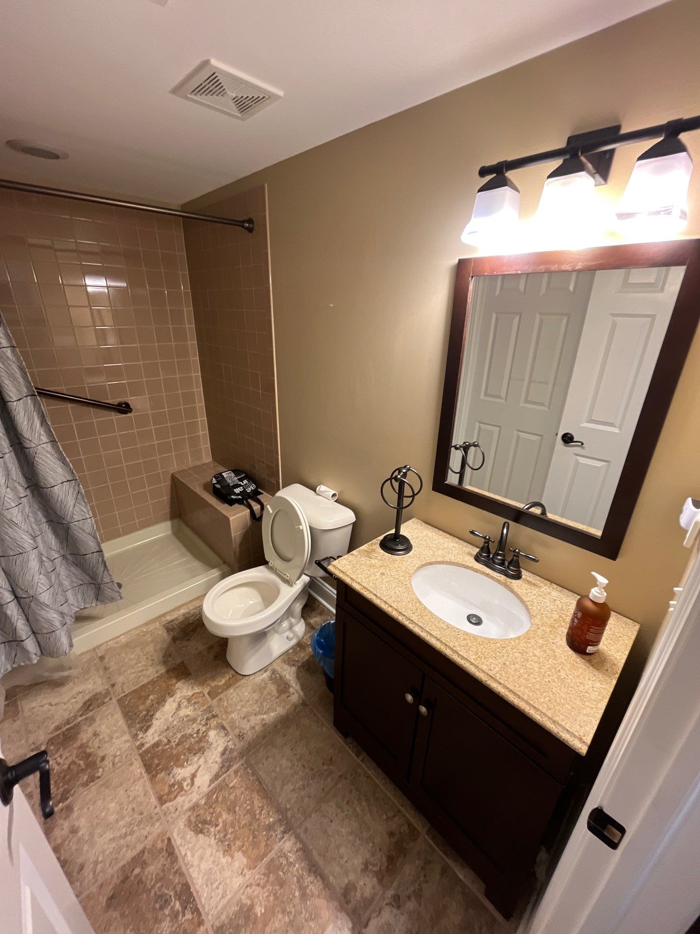 A Tan Bath Gets A Marble Makeover! by Snap Home Solutions