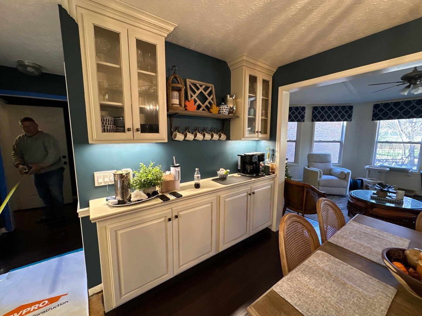 Modern Kitchen Remodel Featuring Quartz Backsplash, under cabinet lighintg, and a coffee bar in Mt. Juliet Tennessee by DeRo Renovations,LLC