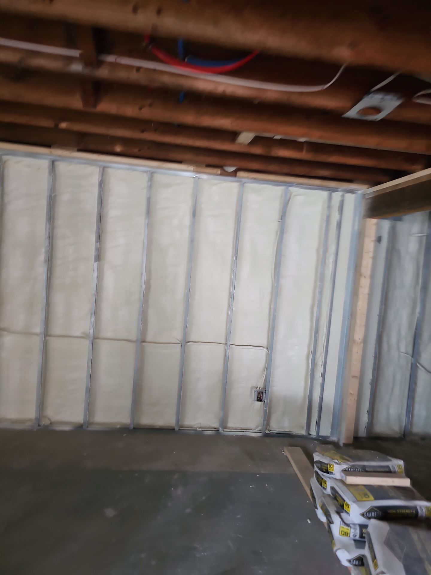 Basement Exterior Walls using Closed Cell Spray Foam by NYS Foam & Energy