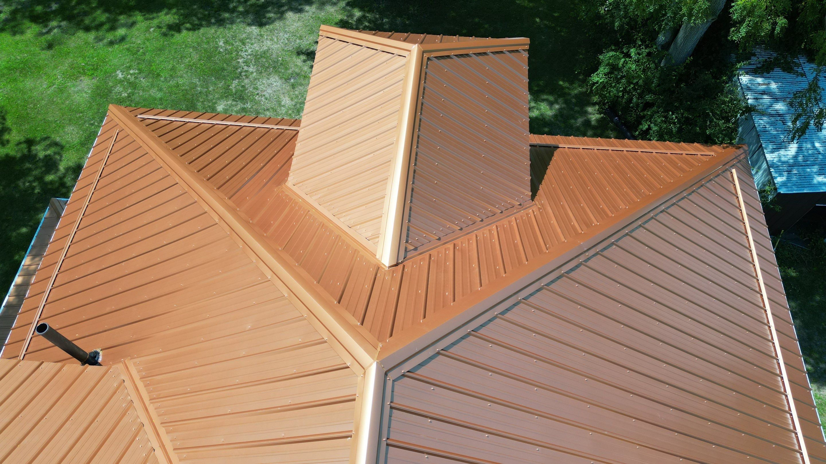 Residential Roofing Installation using Performance Panel Metal - Copper Metallic by RoofX 