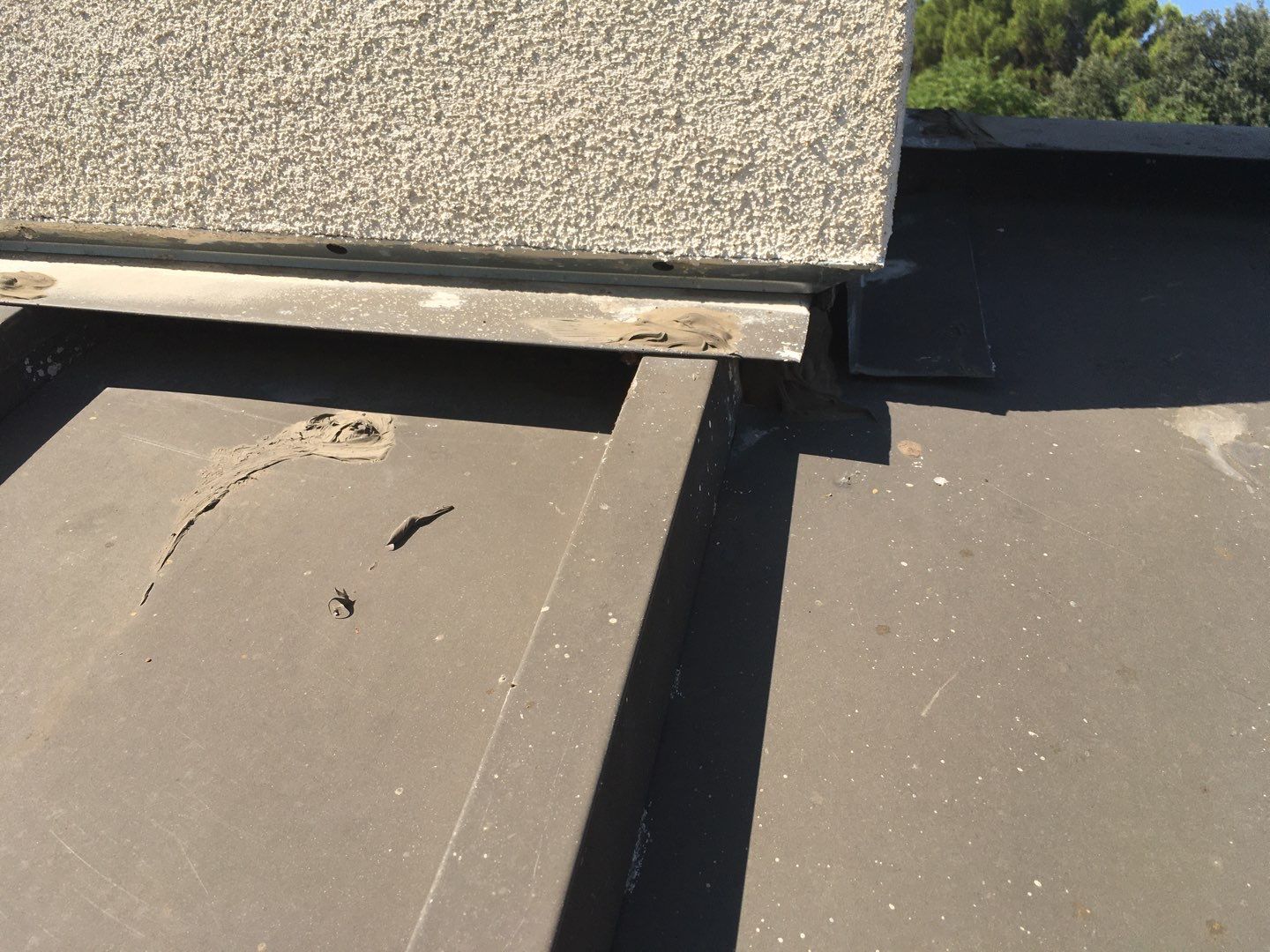 Spray foam and coatings inside commercial building HVAC well using Spray foam and coatings over existing BUR system by Straight Edge Roofing Inc