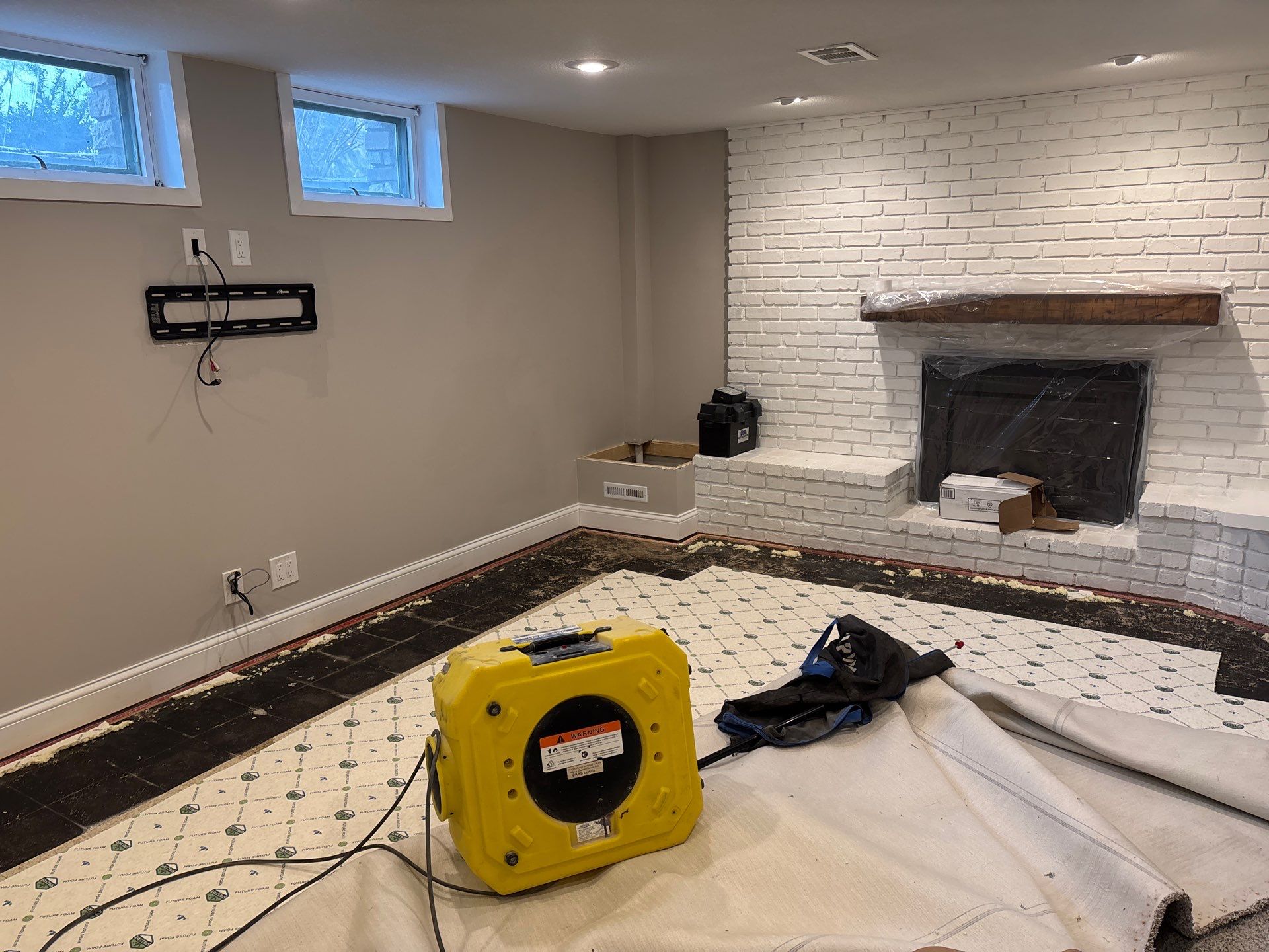 Interior Drain Tile & Sump Pump in Northwest Minneapolis by Waterproofing Northeast