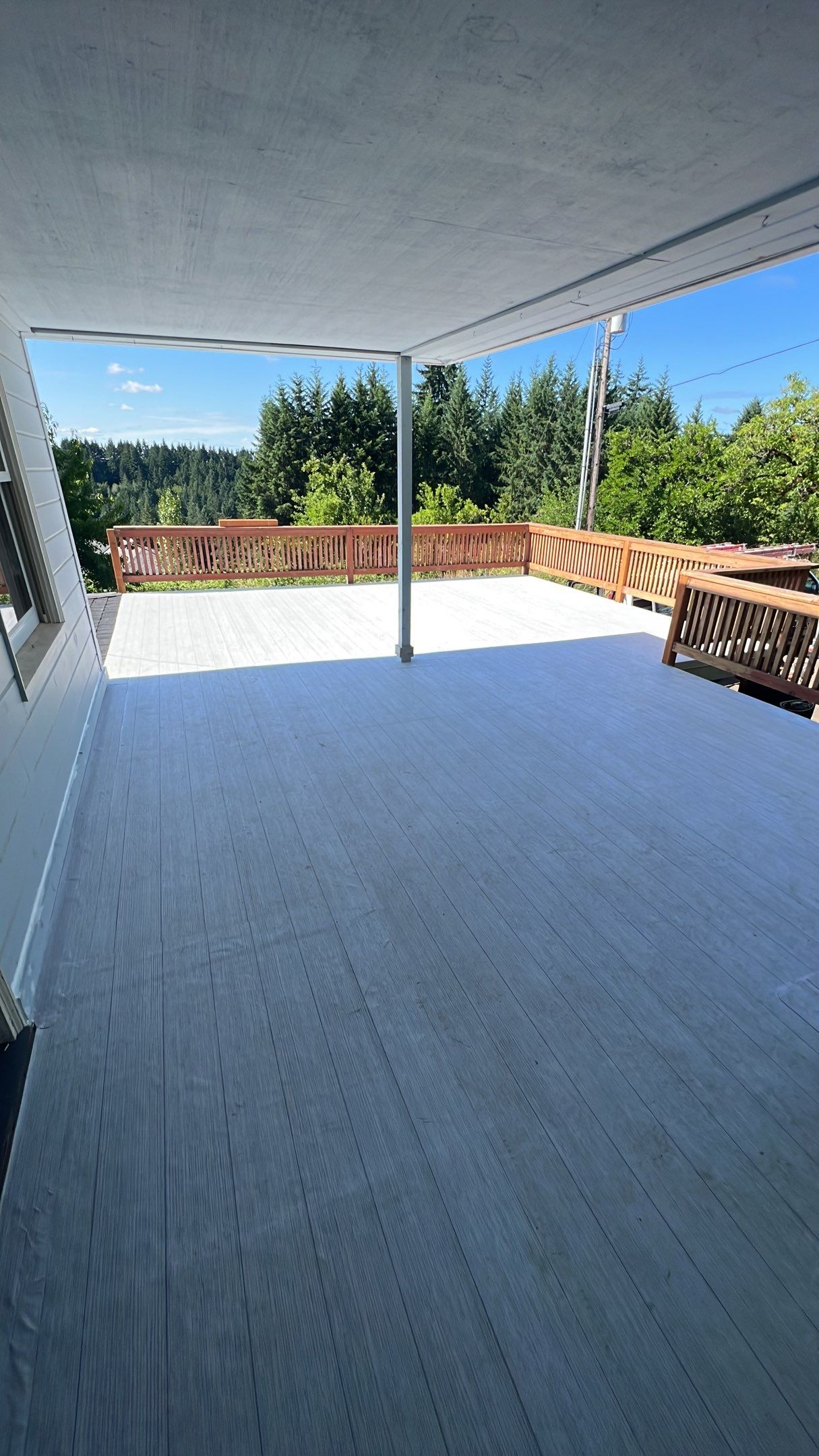 Residential Deck Replacement using Dec-Tec Membrane Color: Grafton by Orezona Building & Roofing Company, Inc.