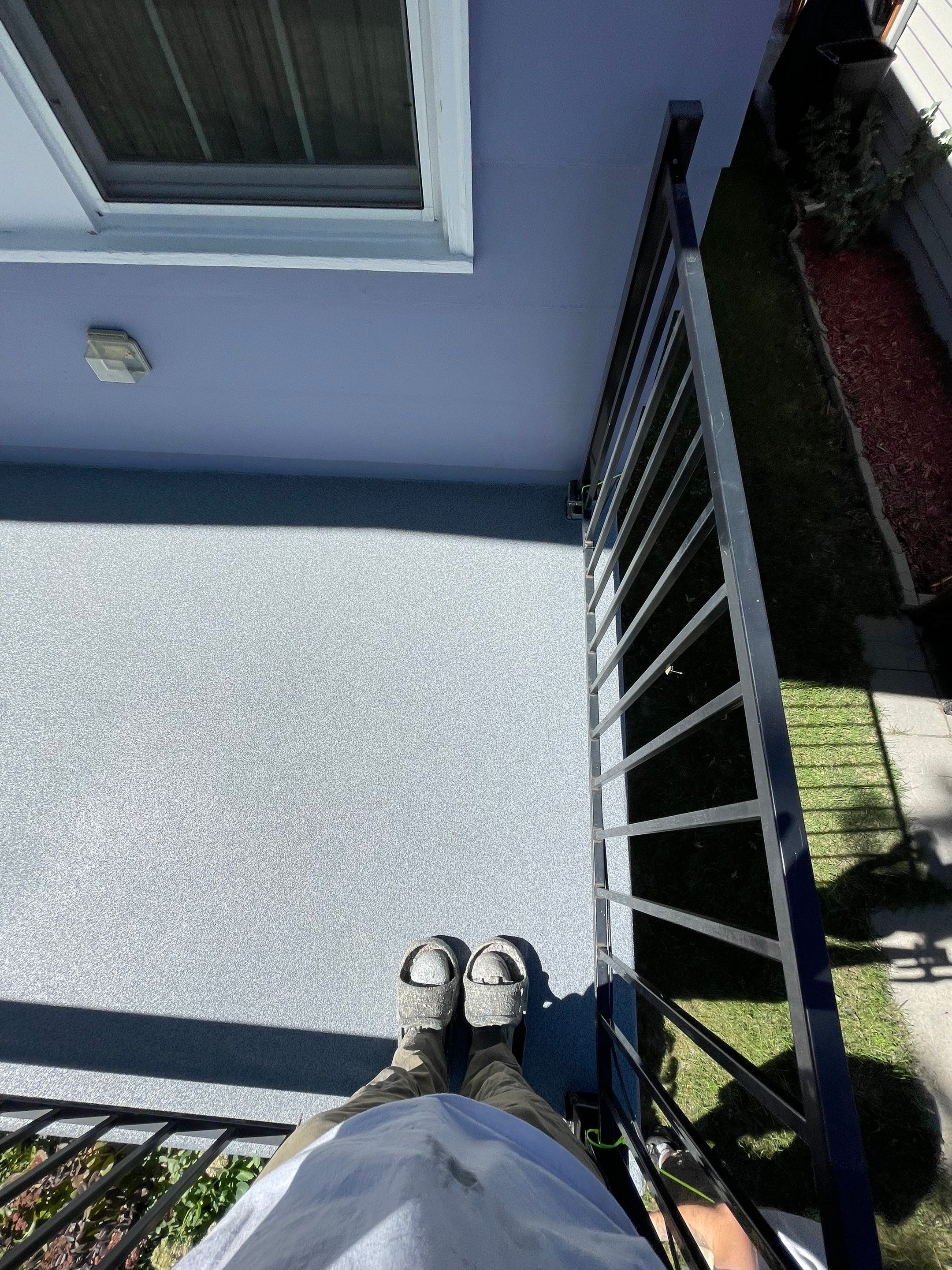 Sioux Falls Concrete Porch Coating with Starry Evening Finish by Select Painting, Coatings & Garage Cabinets