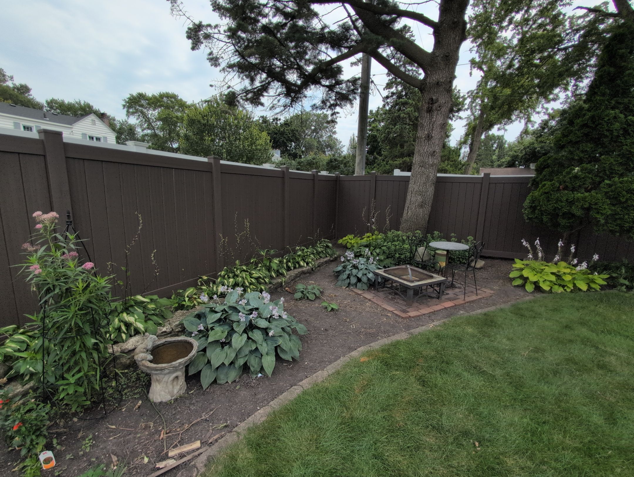 Walnut Vinyl Privacy Fence Installation in Waterloo by Perfect Picket Fence and Stain