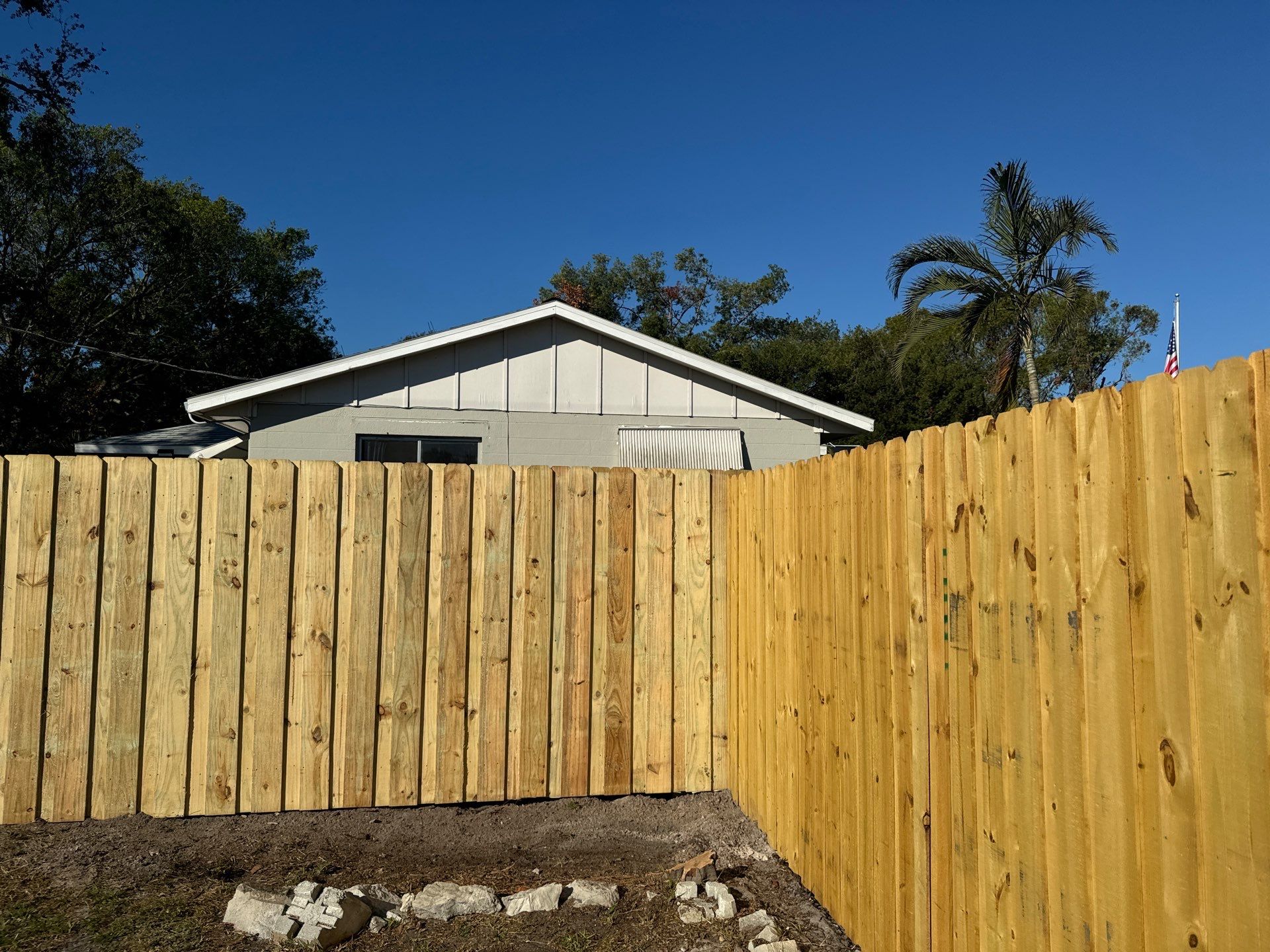 Wood Fence Installation using 6Ft Pressure Treated Wood Board On Board Privacy Fence by Asap fence and gates, LLC