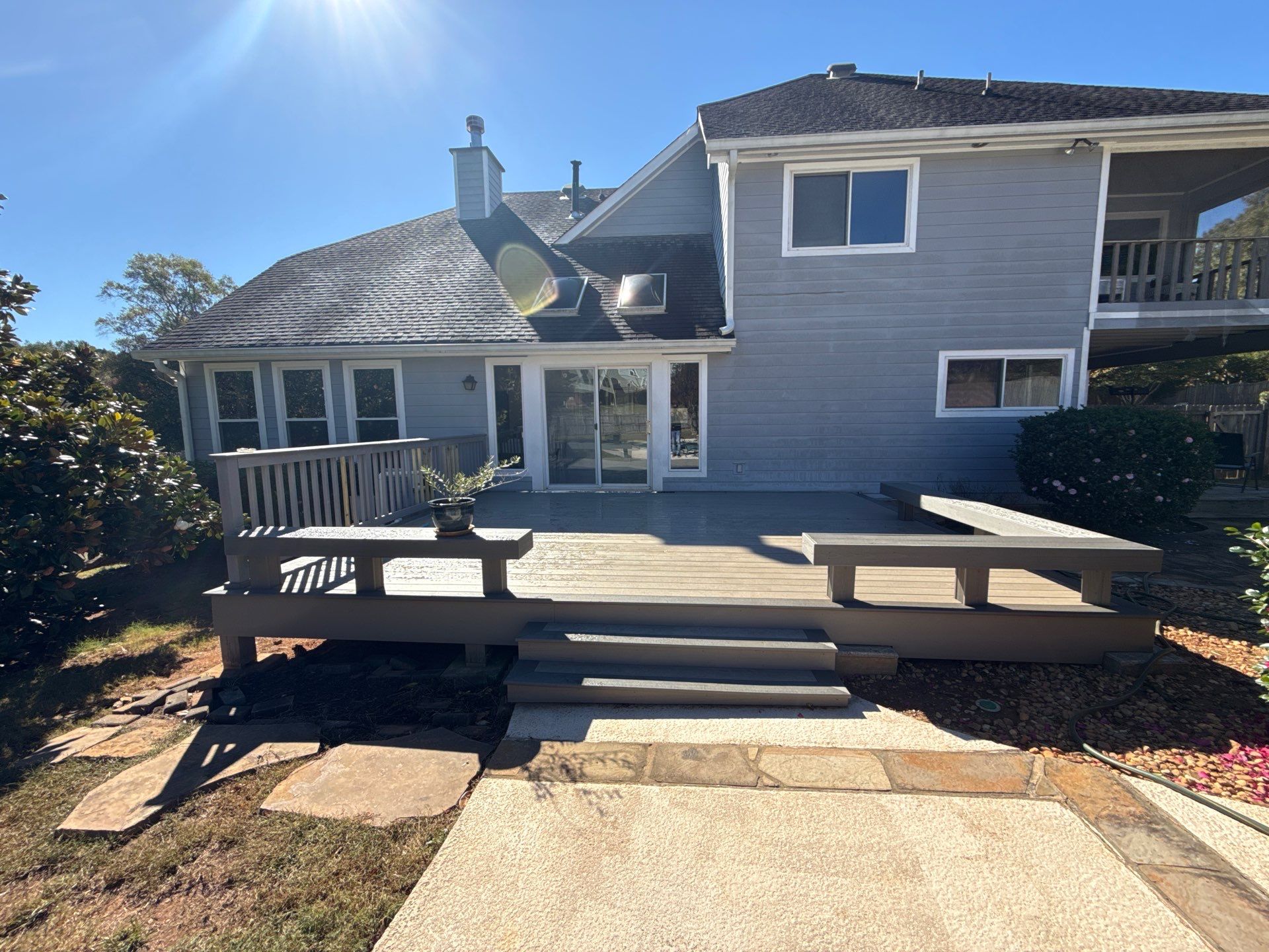 Custom Composite Deck with Integrated Seating in Roswell by Swift Home Renovations