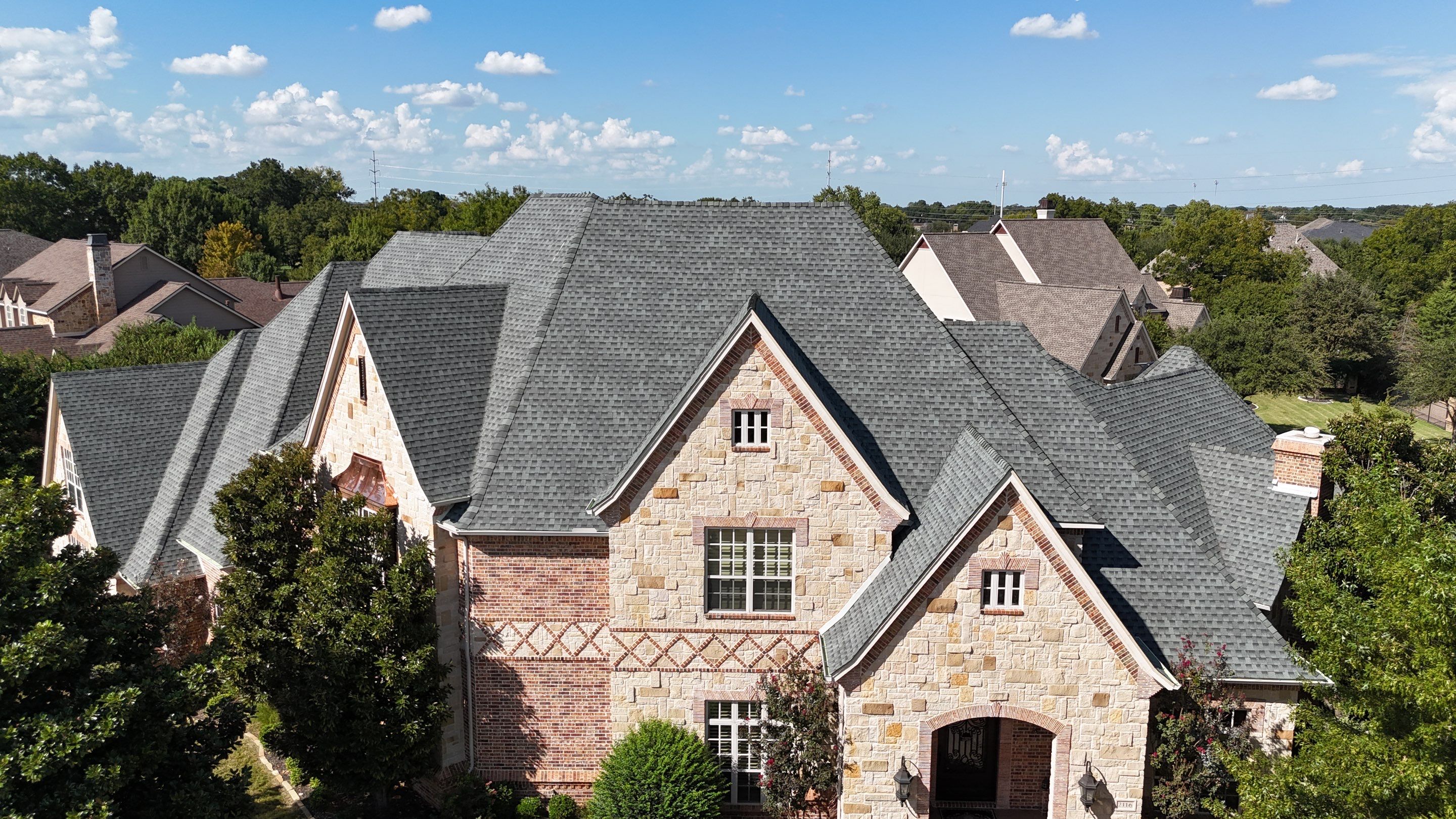 Southlake Texas Estate - Roof, Copper Awning and Gutter Project by First United Roofing & Construction